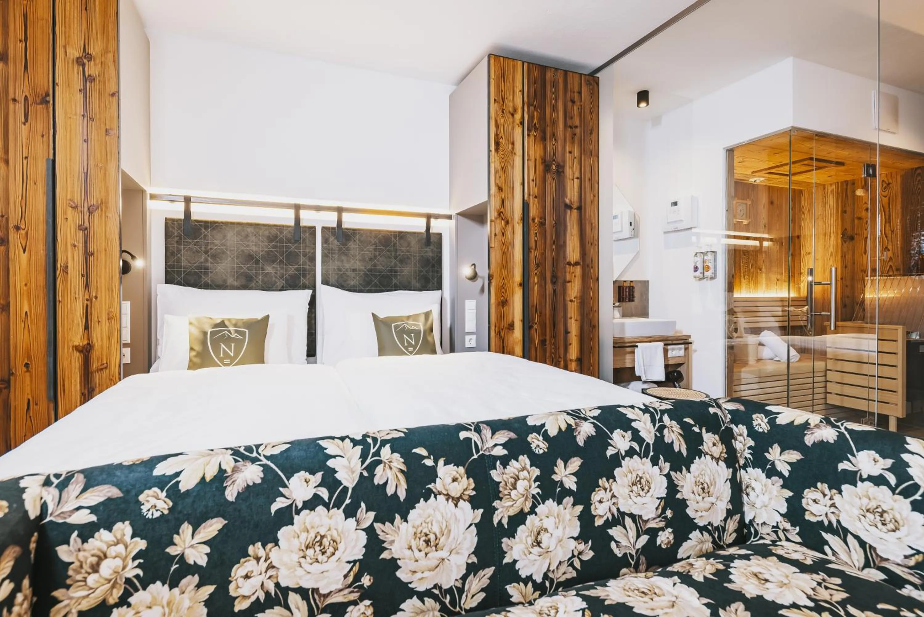 Bed in Nikolaus by AvenidA Panoramic Wellness Suites