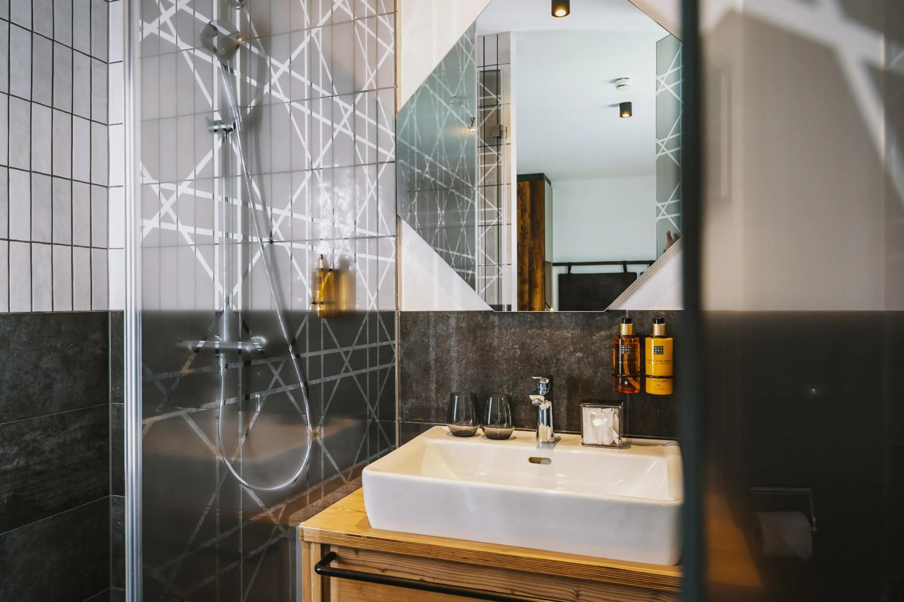 Bathroom in Nikolaus by AvenidA Panoramic Wellness Suites