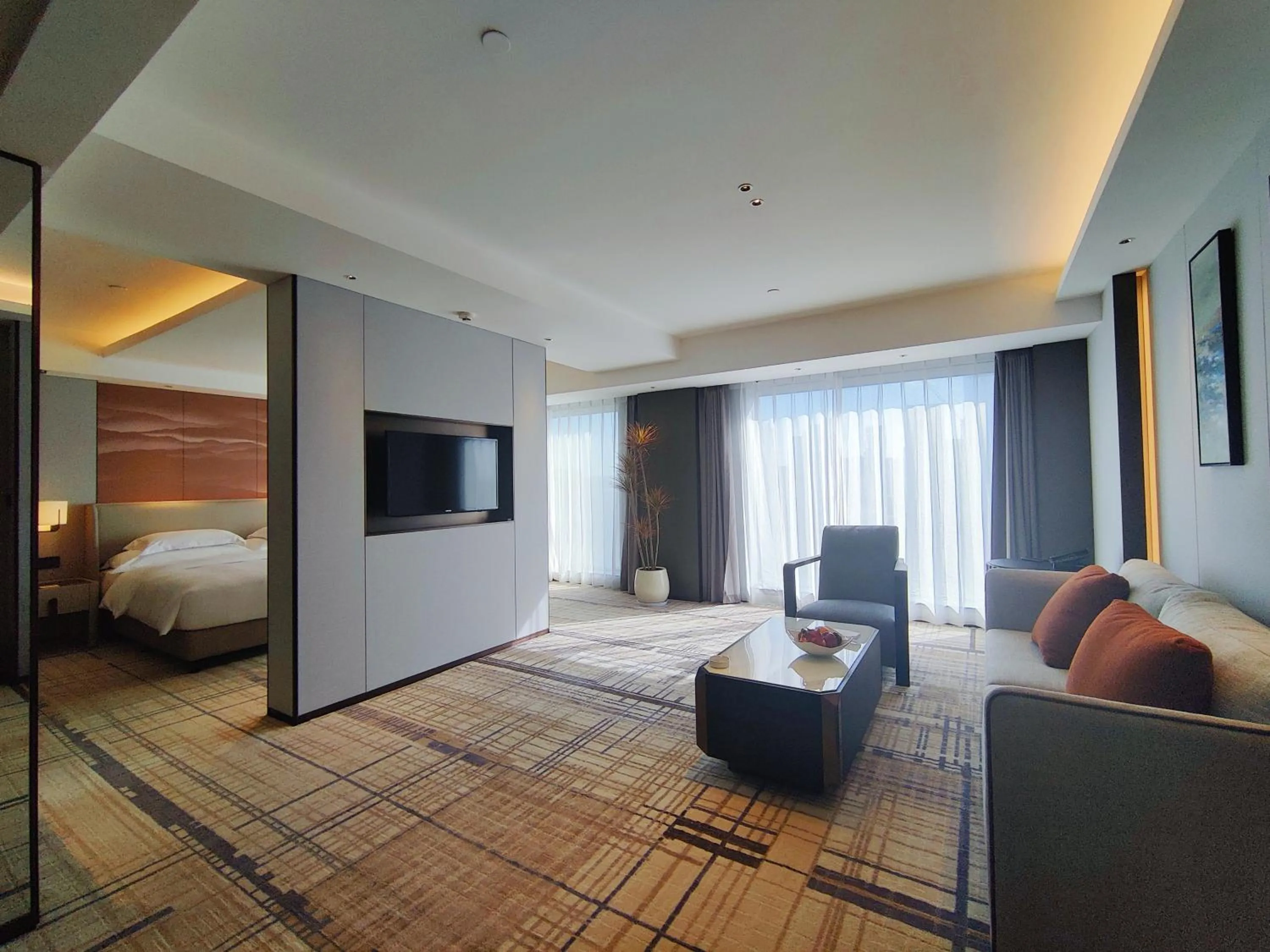 Living room, Bed in Swissôtel Shenyang