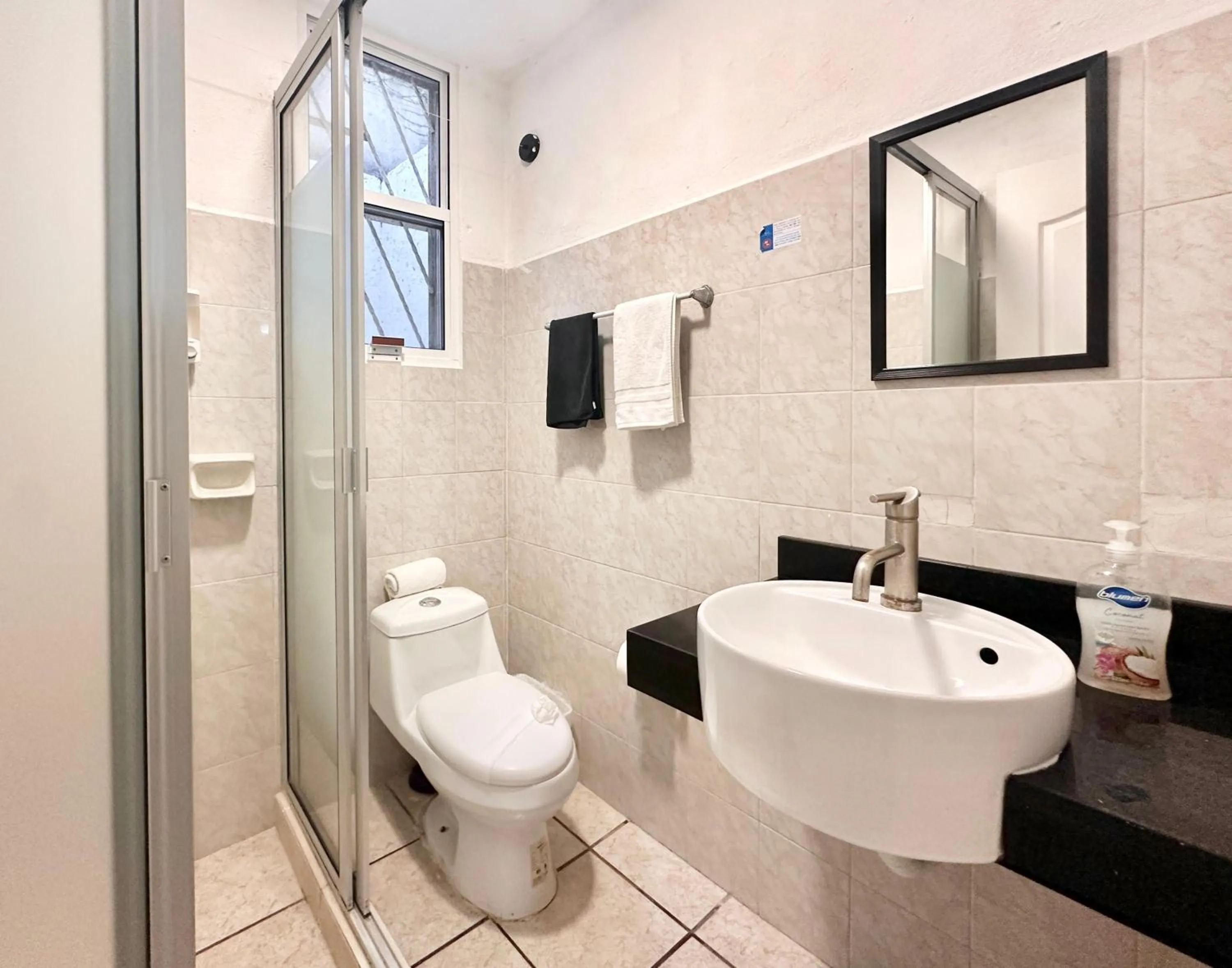 Shower in Coco Suites by Andiani Travel