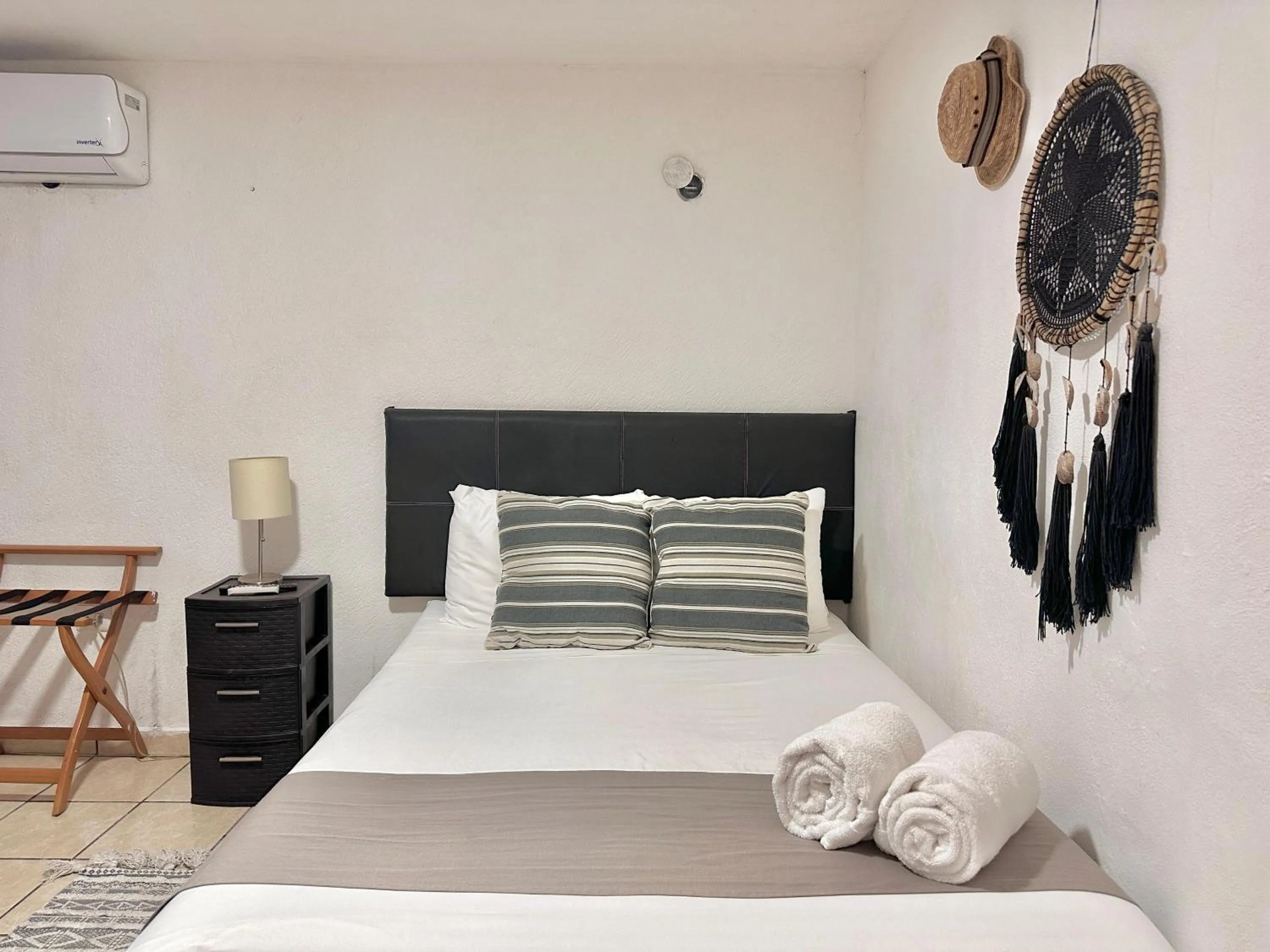 Photo of the whole room, Bed in Coco Suites by Andiani Travel