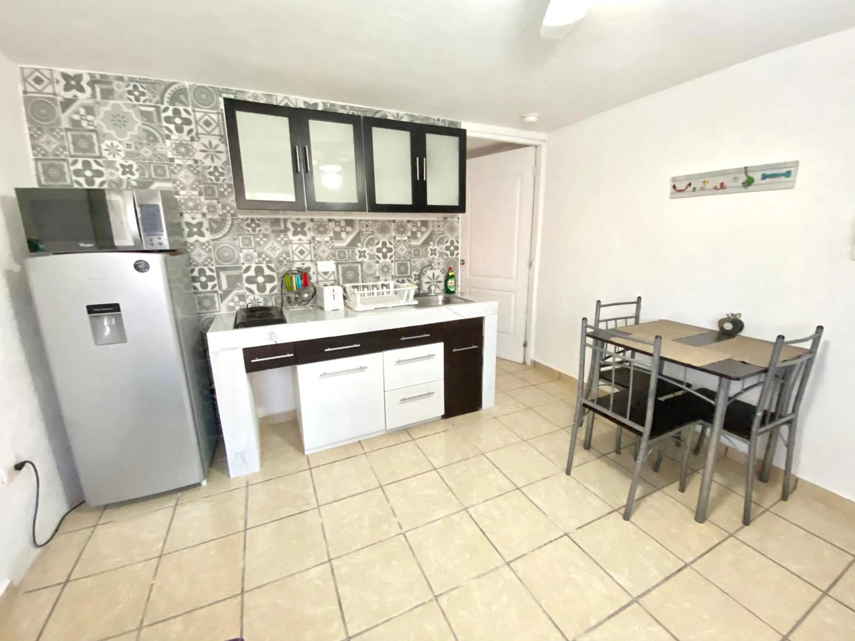 Kitchen or kitchenette in Coco Suites by Andiani Travel