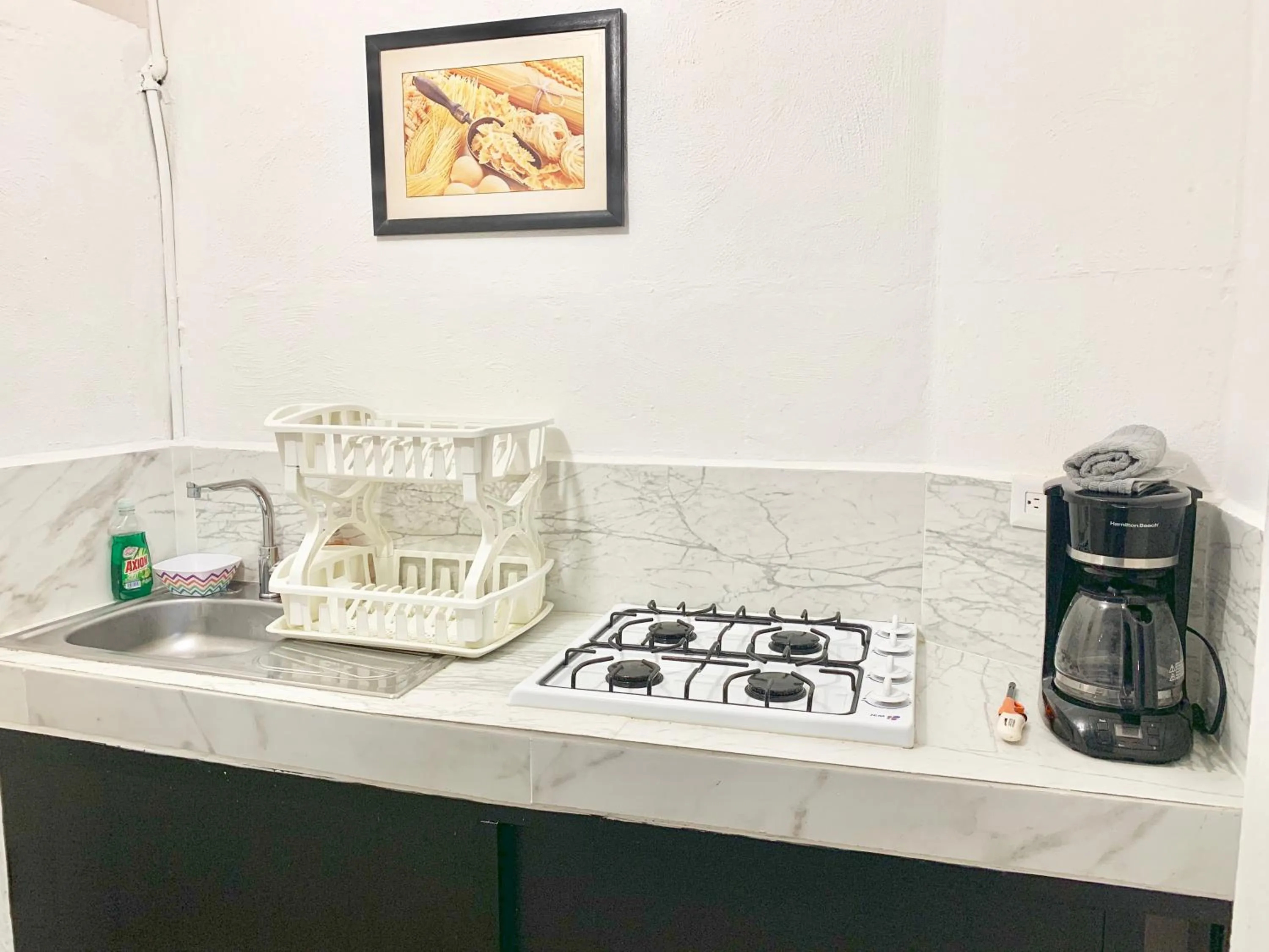 Kitchen or kitchenette in Coco Suites by Andiani Travel