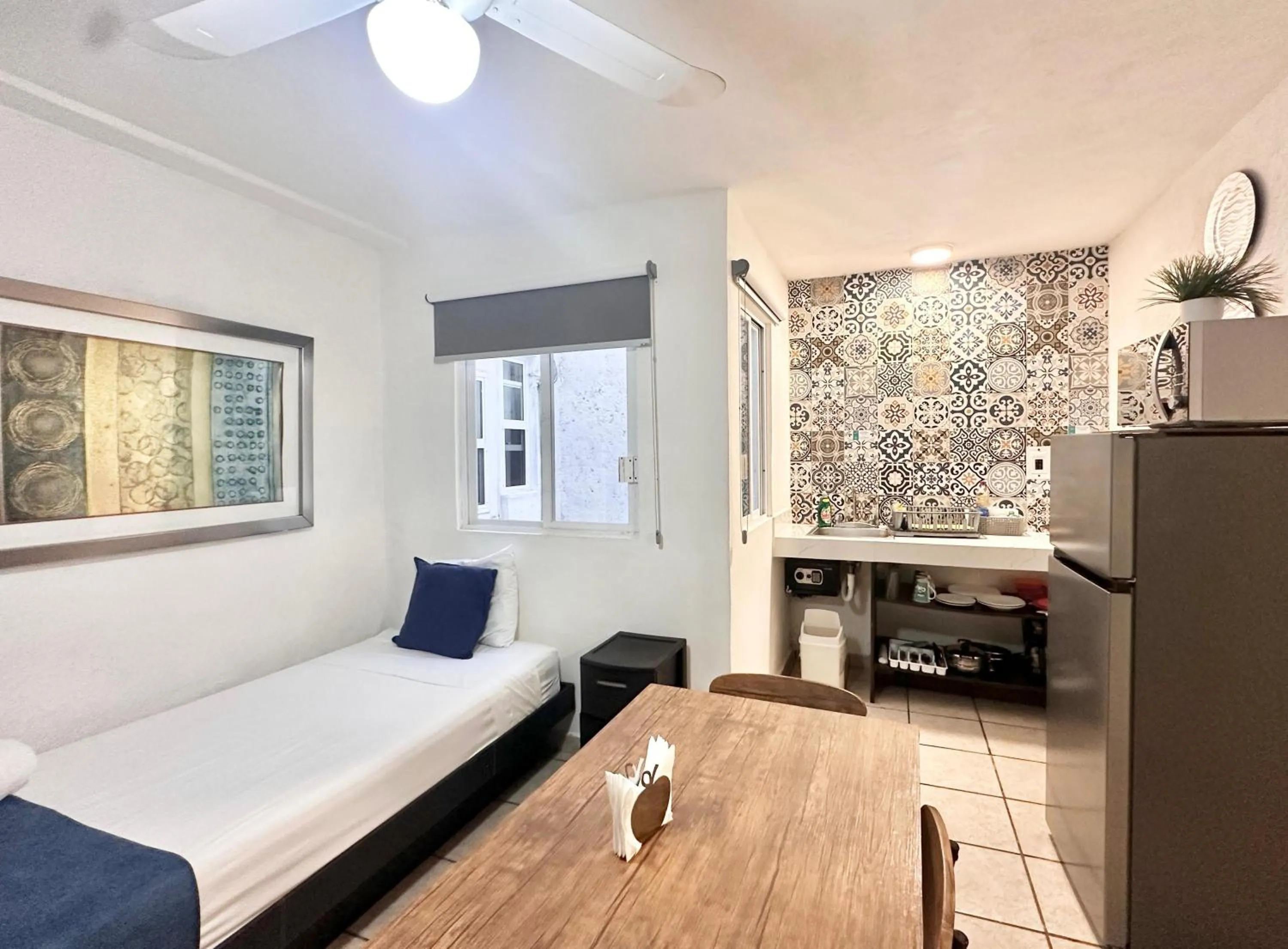 Kitchen or kitchenette, Bed in Coco Suites by Andiani Travel