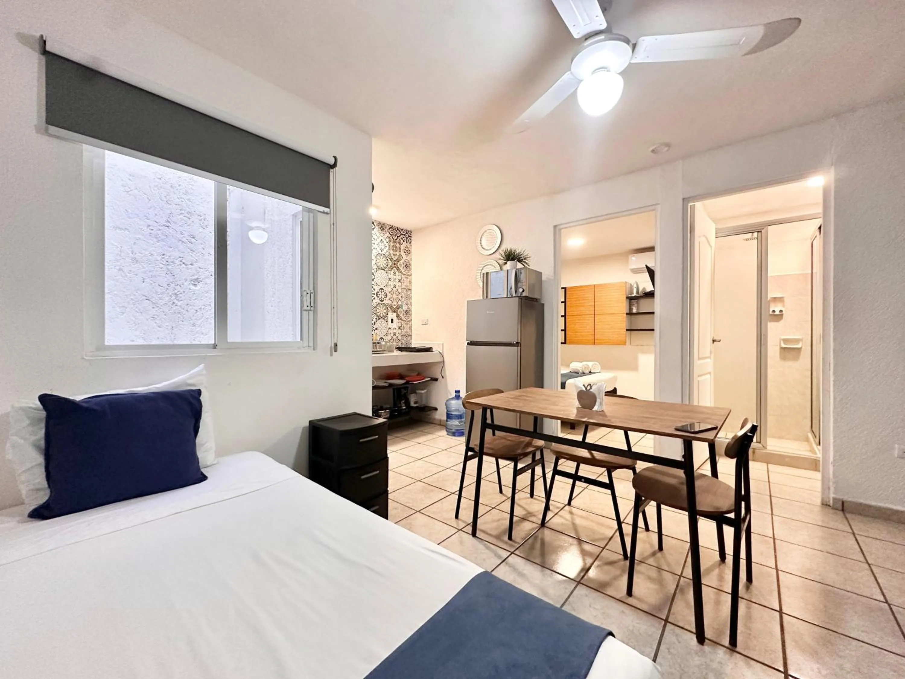 Kitchen or kitchenette, Bed in Coco Suites by Andiani Travel