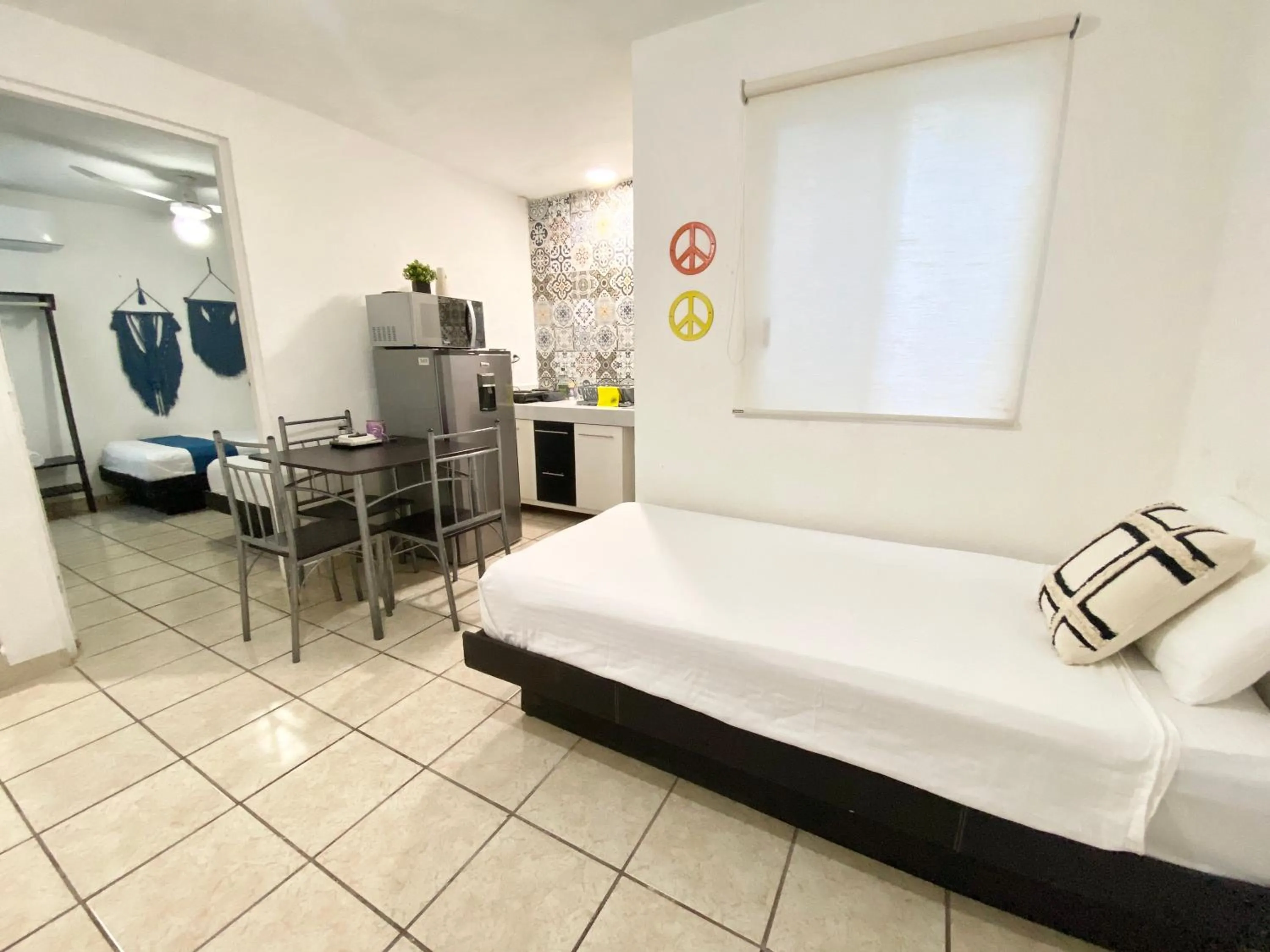 Photo of the whole room, Bed in Coco Suites by Andiani Travel