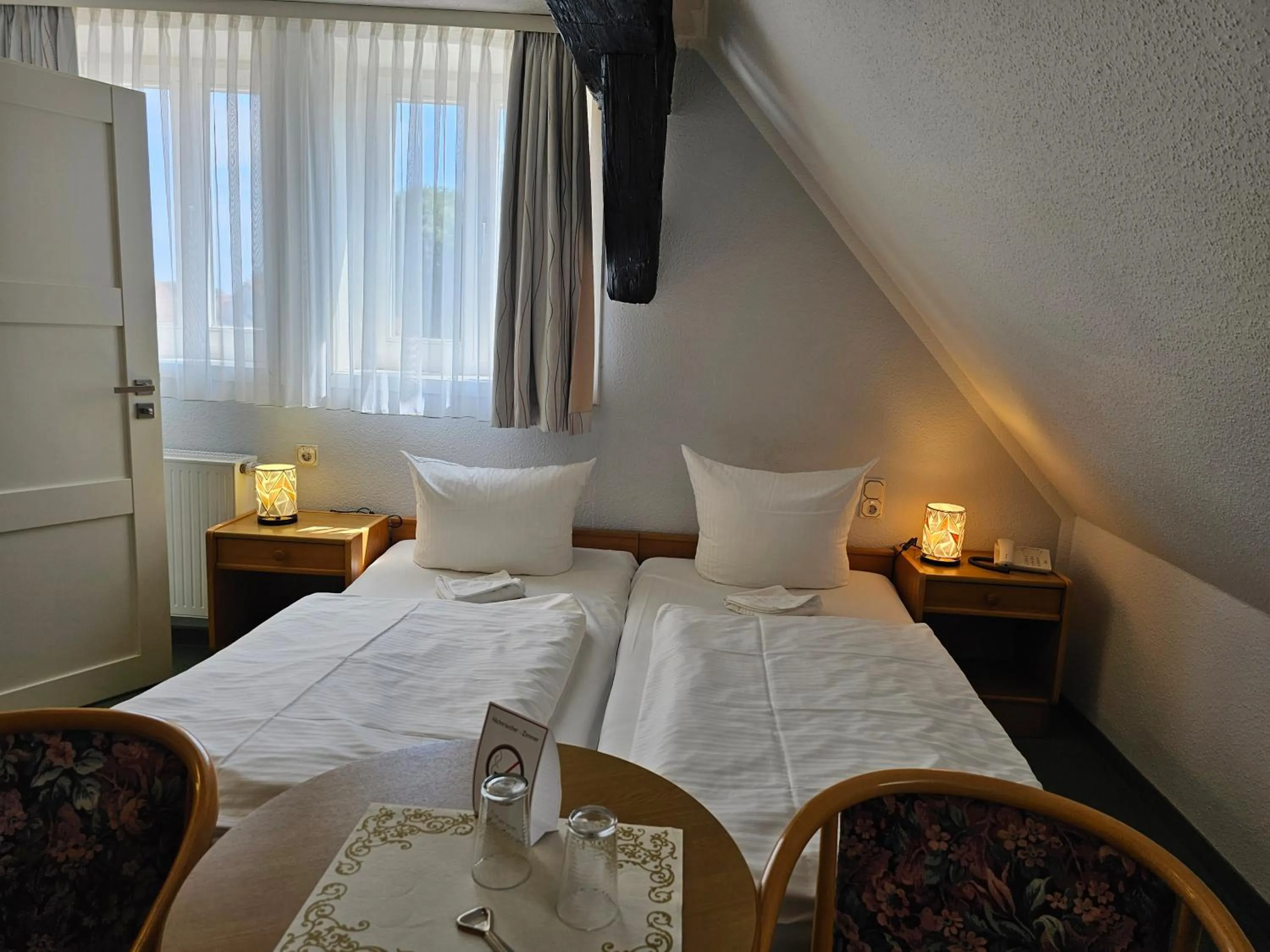 Bed in Hotel Am Markt & Brauhaus Stadtkrug