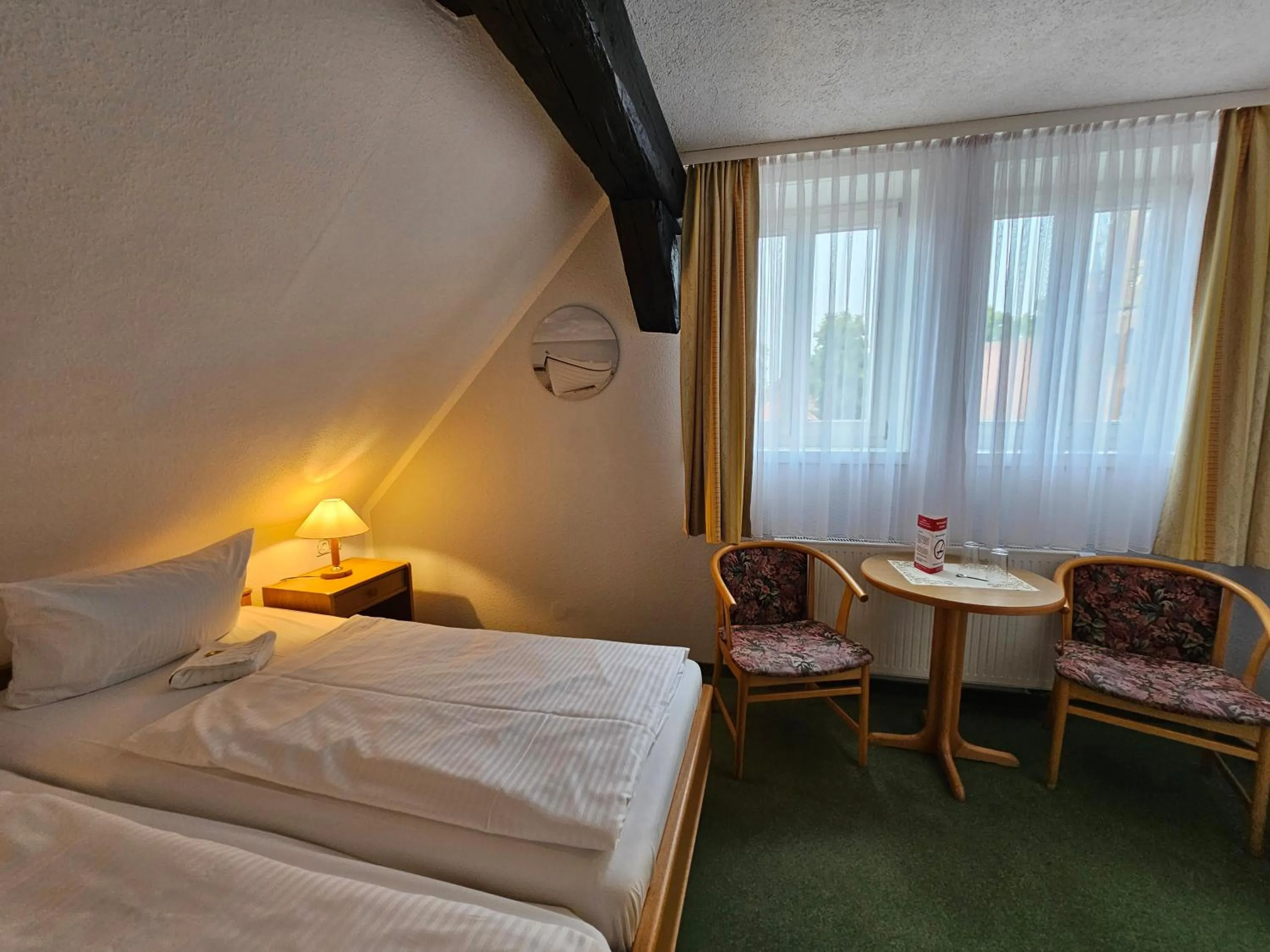 Bed in Hotel Am Markt & Brauhaus Stadtkrug
