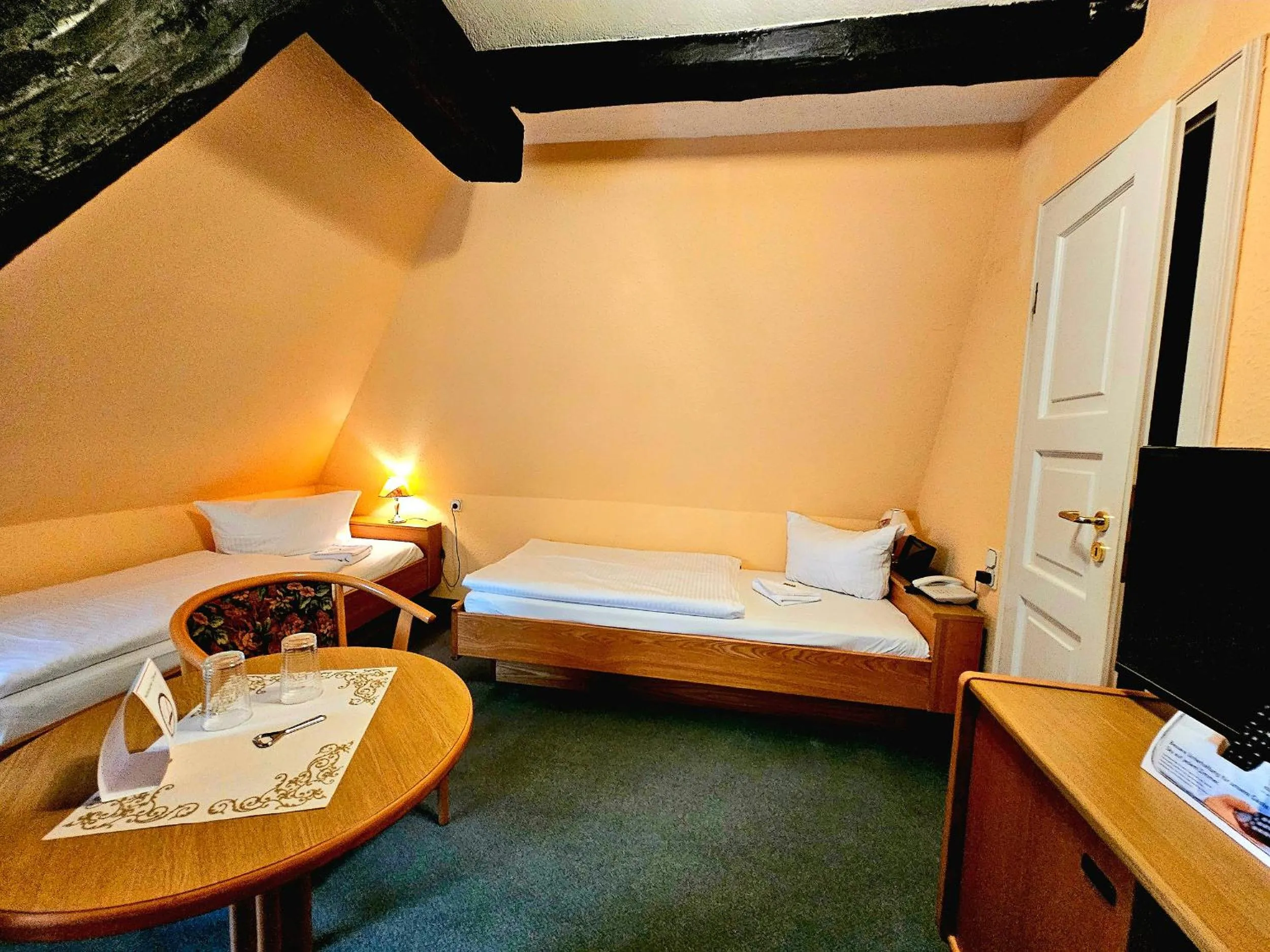 Bed in Hotel Am Markt & Brauhaus Stadtkrug