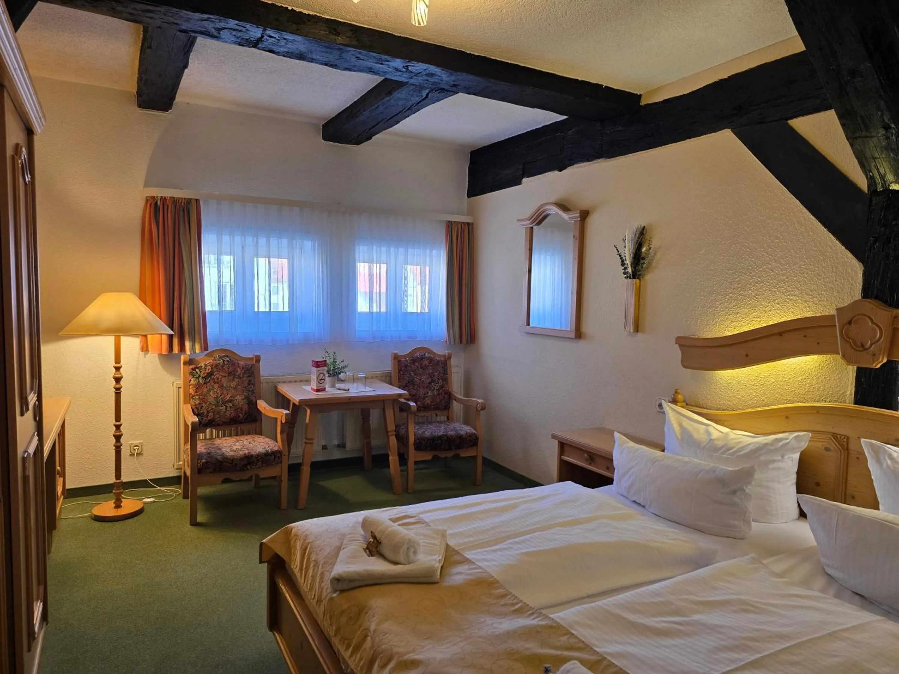 Bed in Hotel Am Markt & Brauhaus Stadtkrug