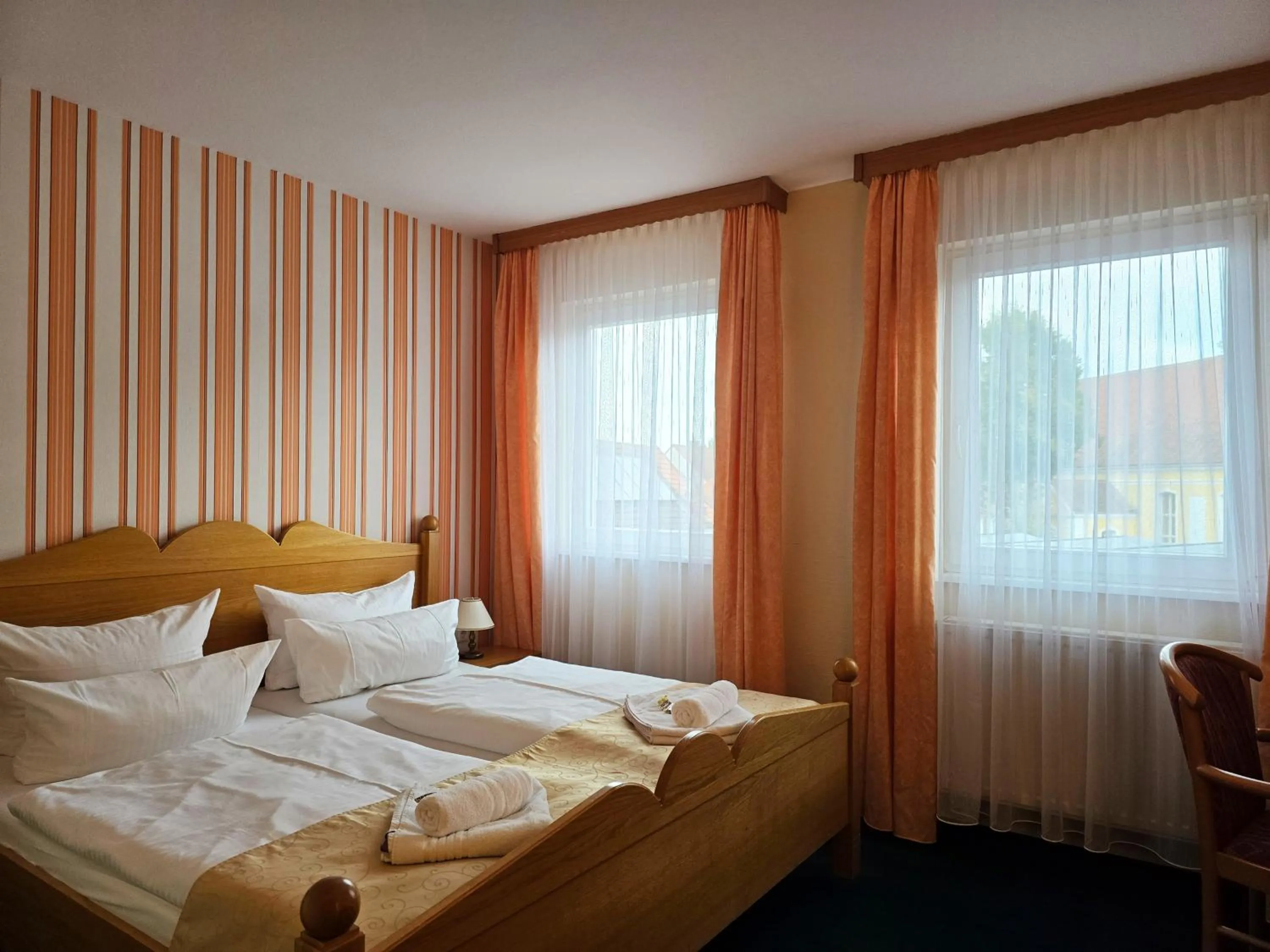 Bed in Hotel Am Markt & Brauhaus Stadtkrug