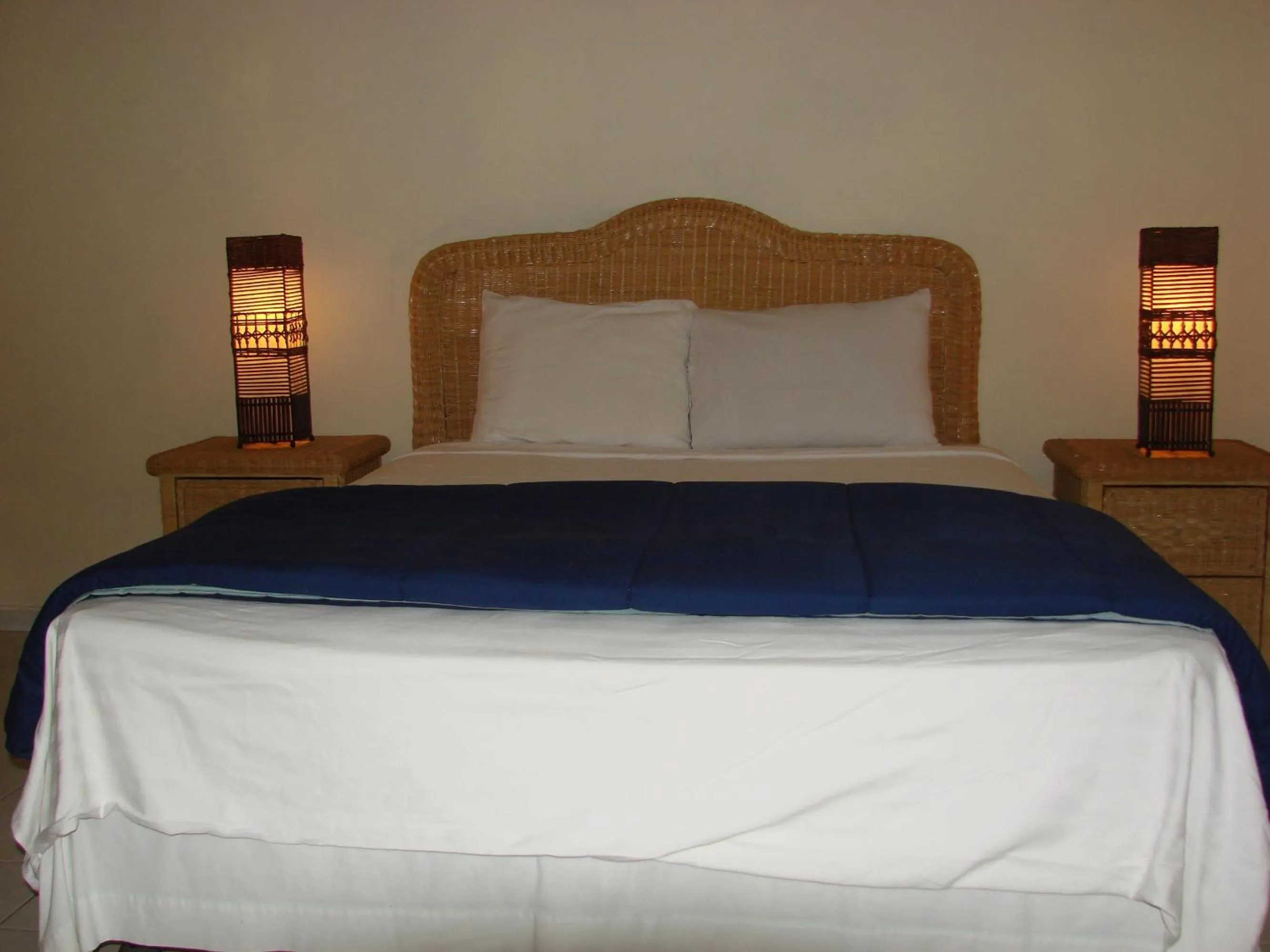 Bed in Cunucu Villas - Aruba Tropical Garden Apartments