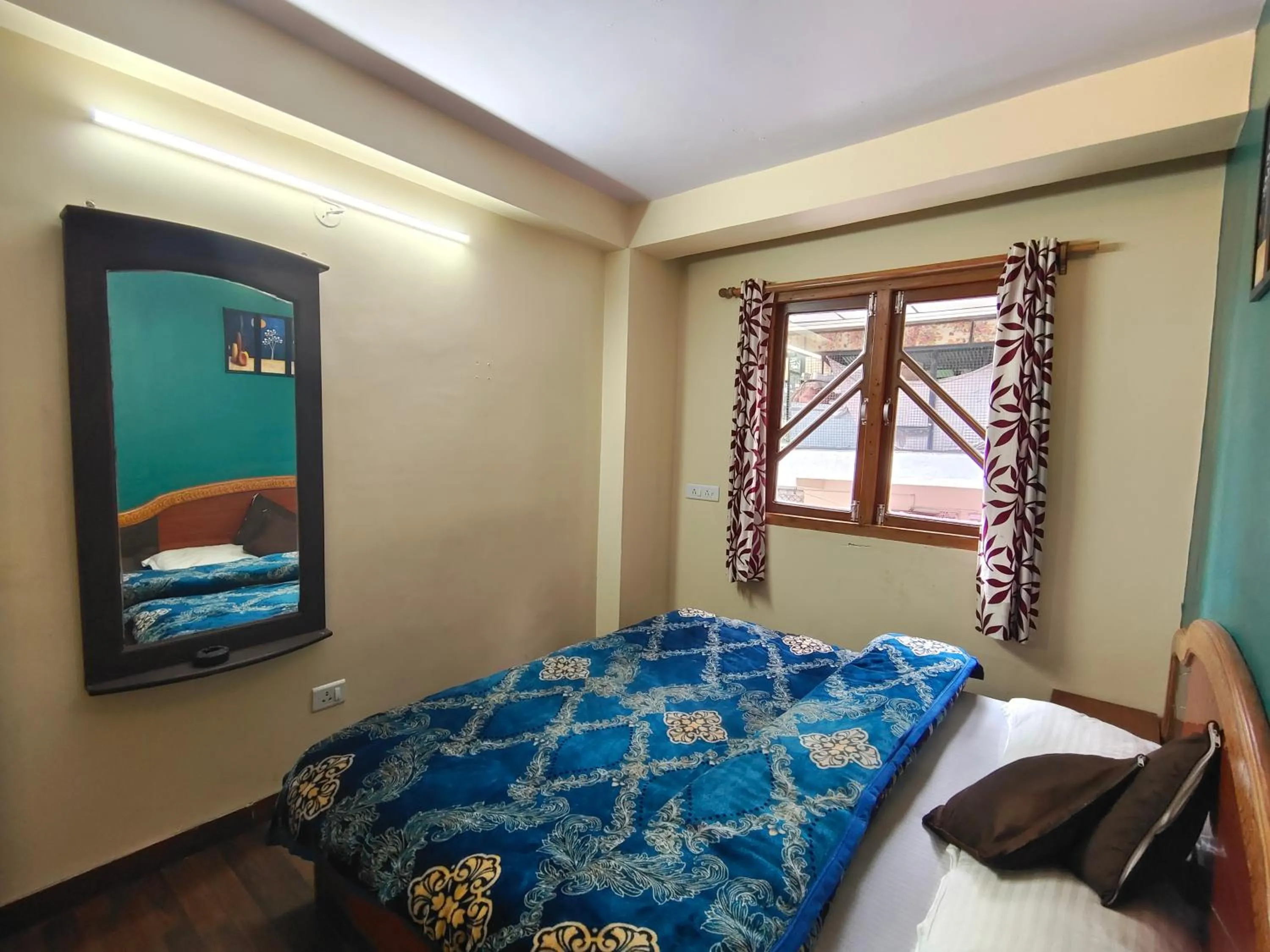 Bed in Singhs BnB by Lazy Getaways