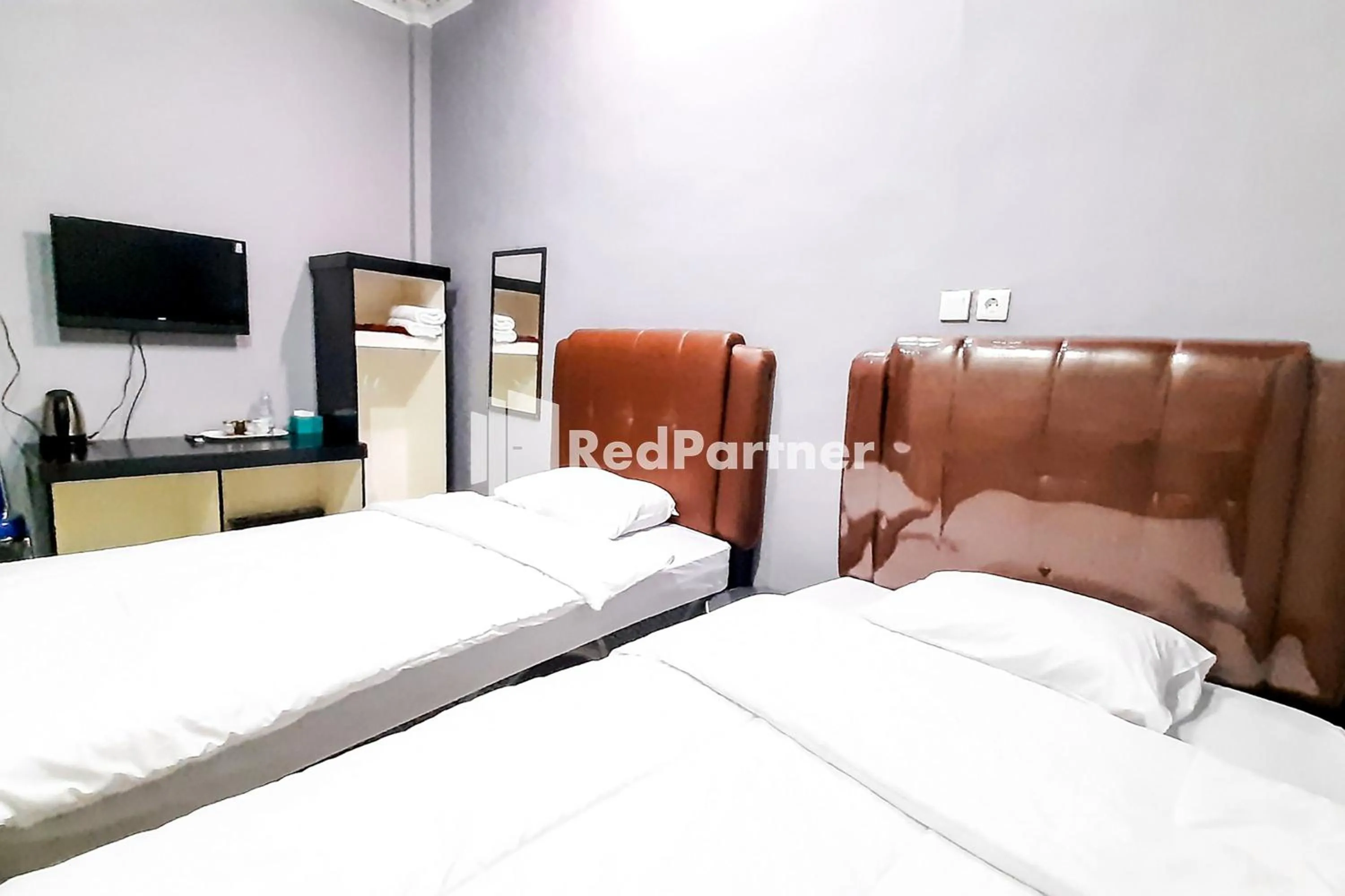 Bedroom, Bed in MT Syariah Homestay Kerinci RedPartner