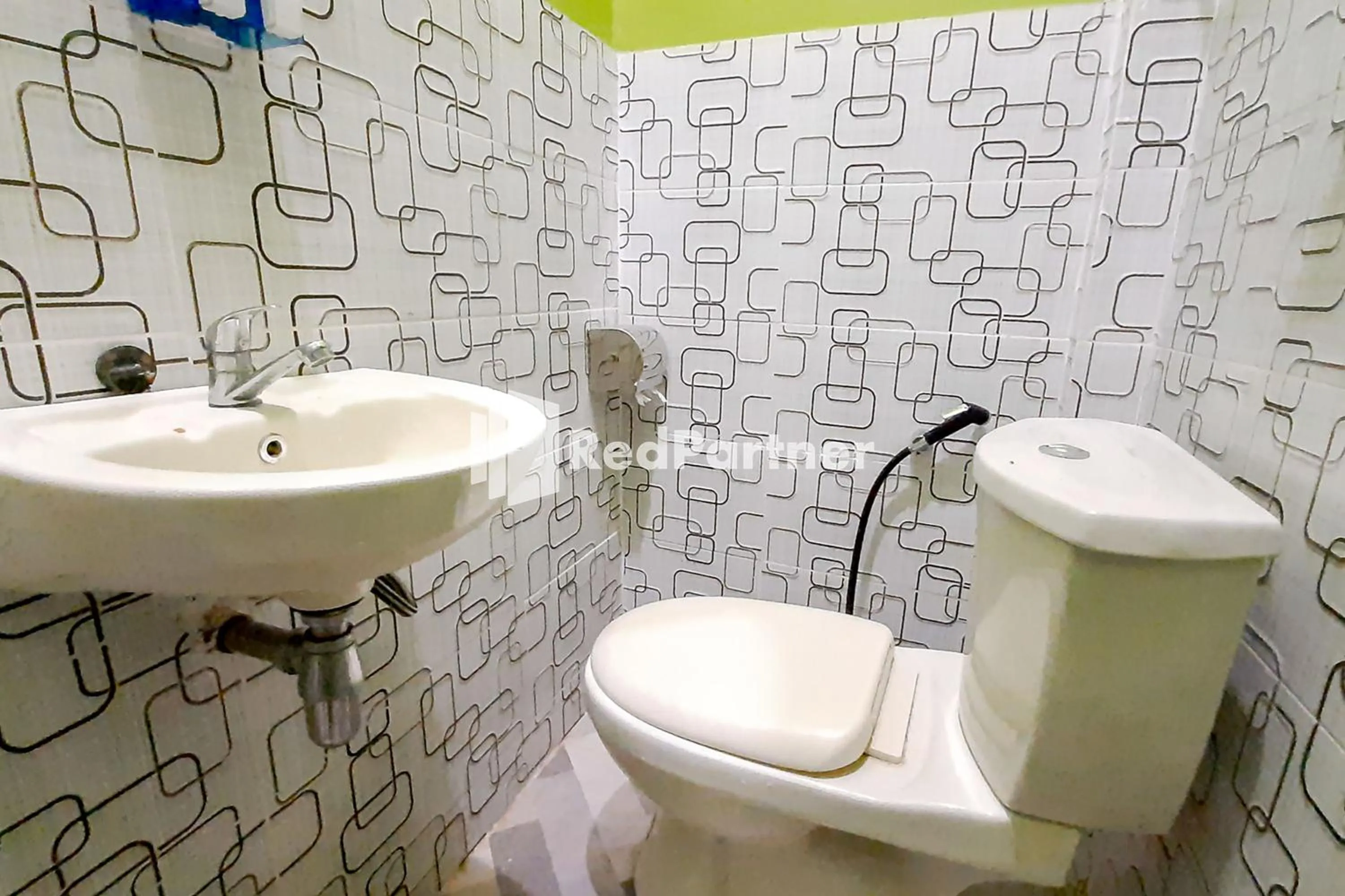 Bathroom in MT Syariah Homestay Kerinci RedPartner