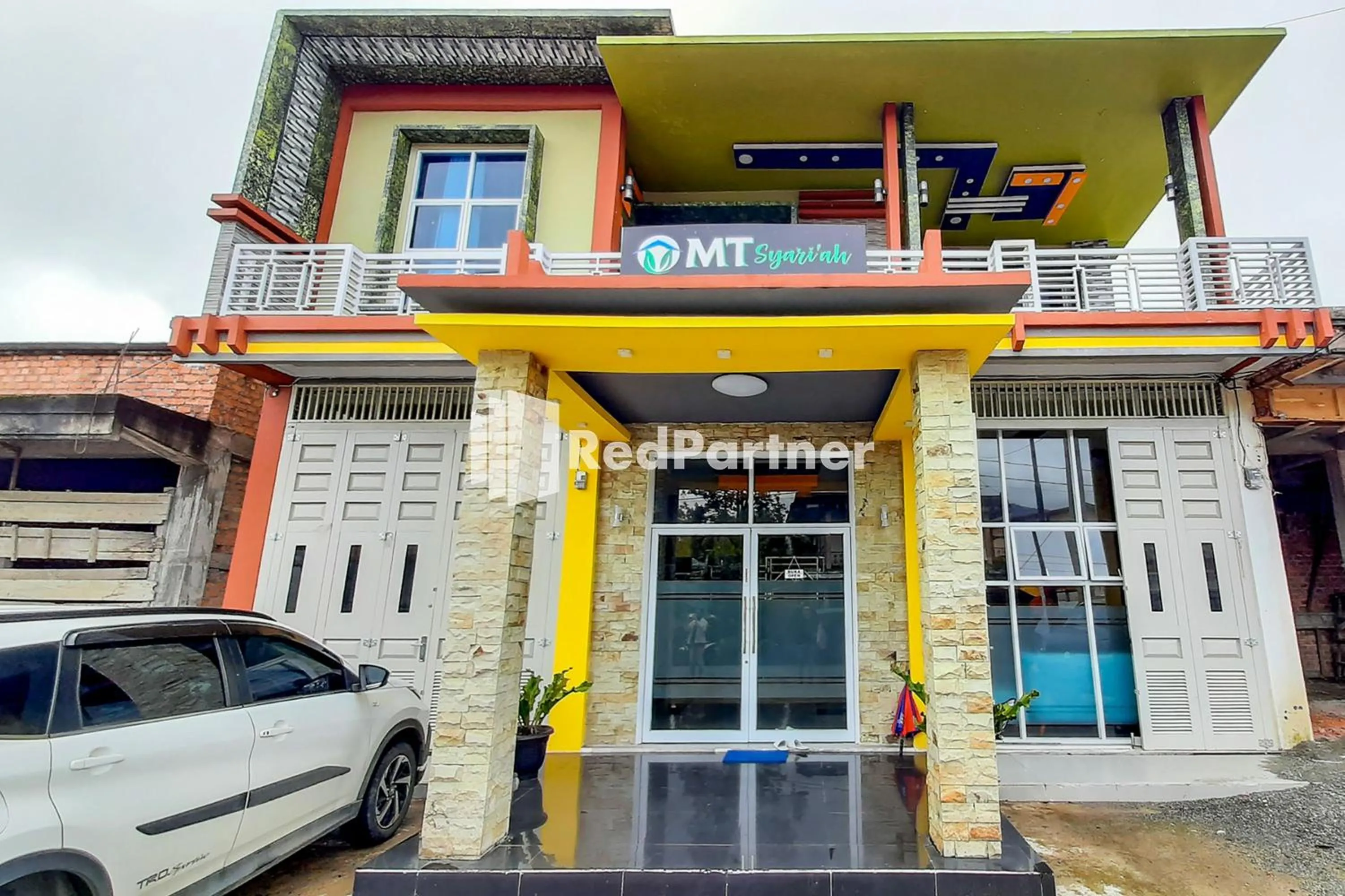 Facade/entrance in MT Syariah Homestay Kerinci RedPartner