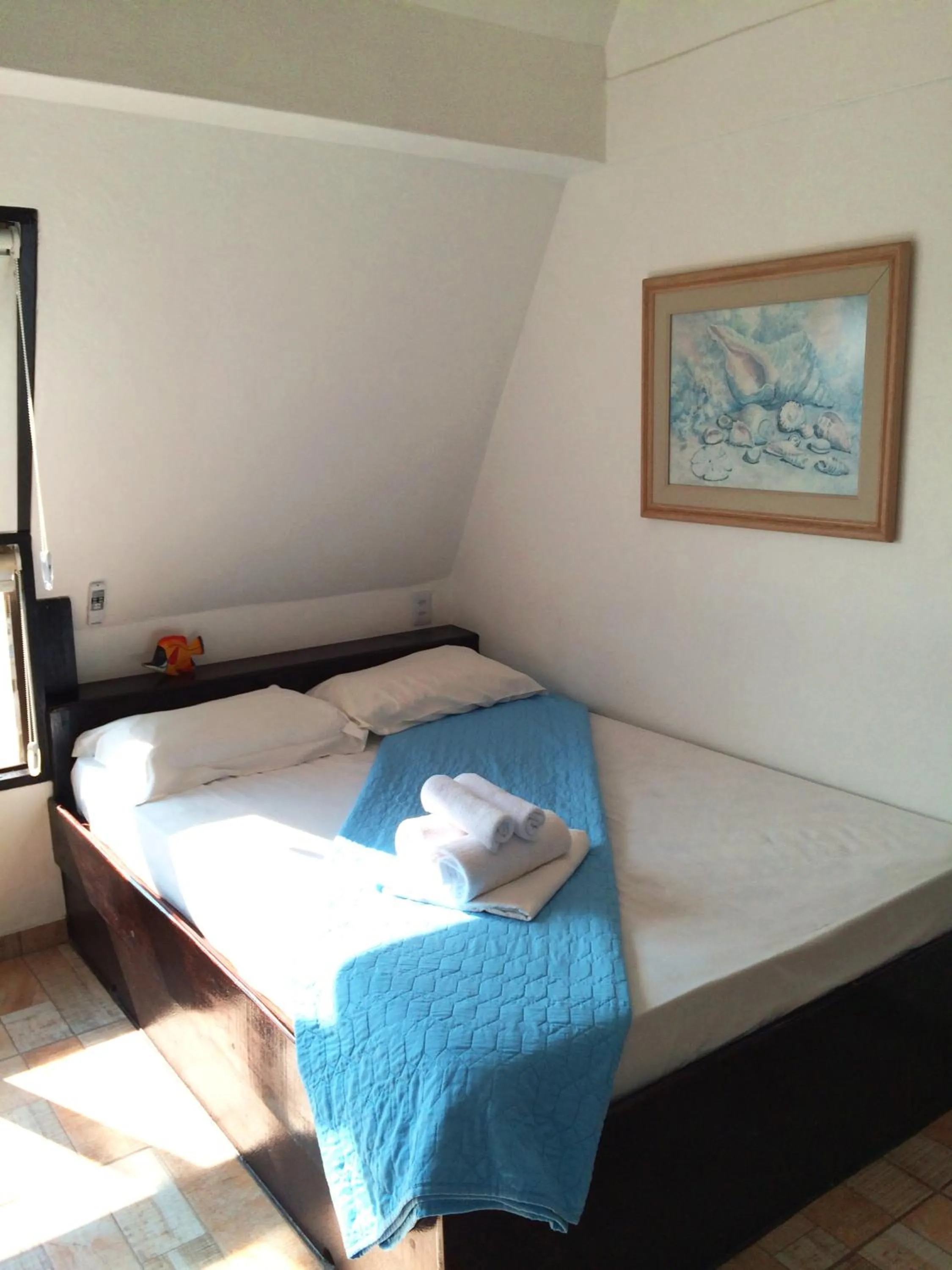 Bed in Pousada Caminho do Mar