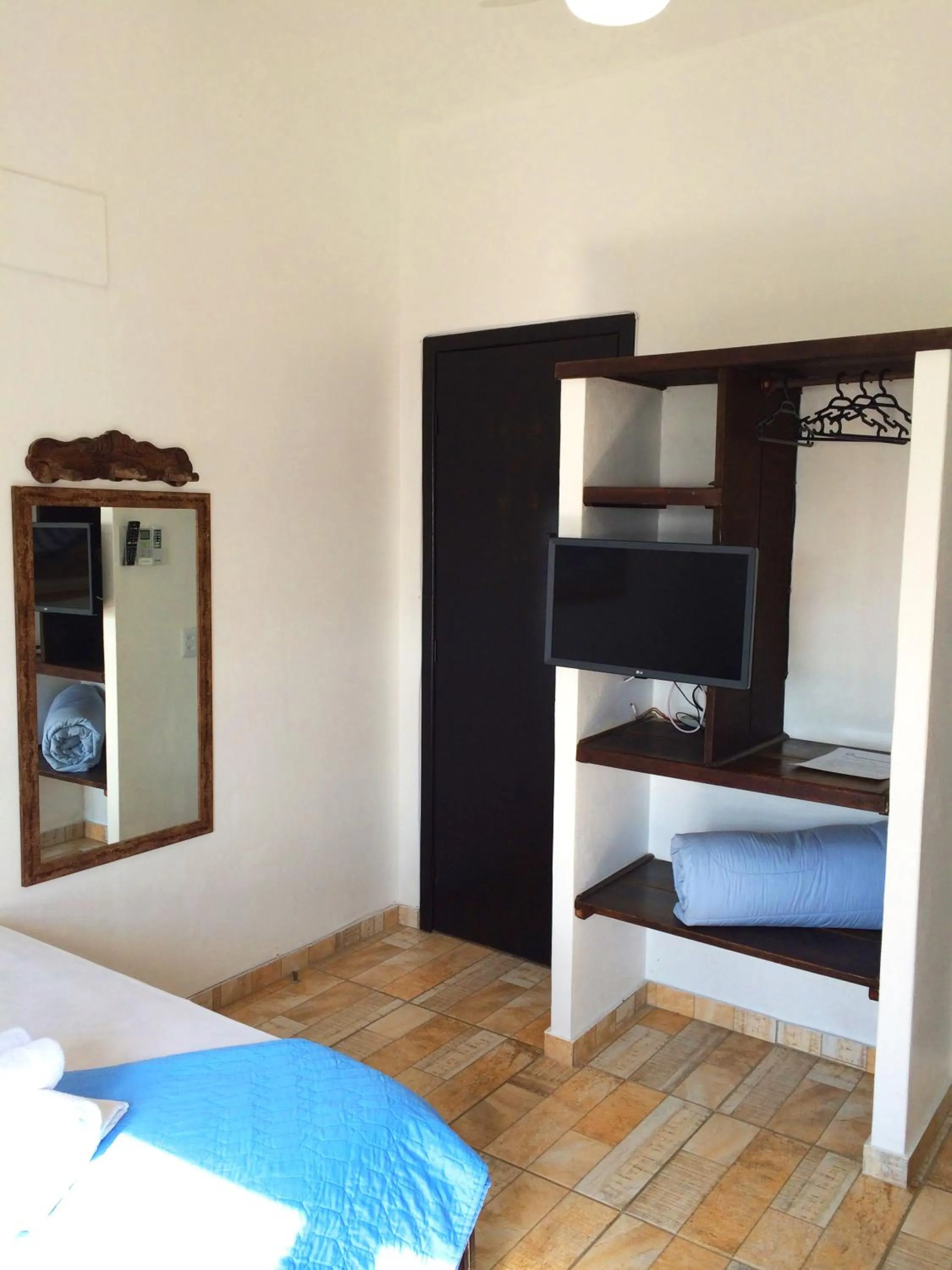 Bed in Pousada Caminho do Mar