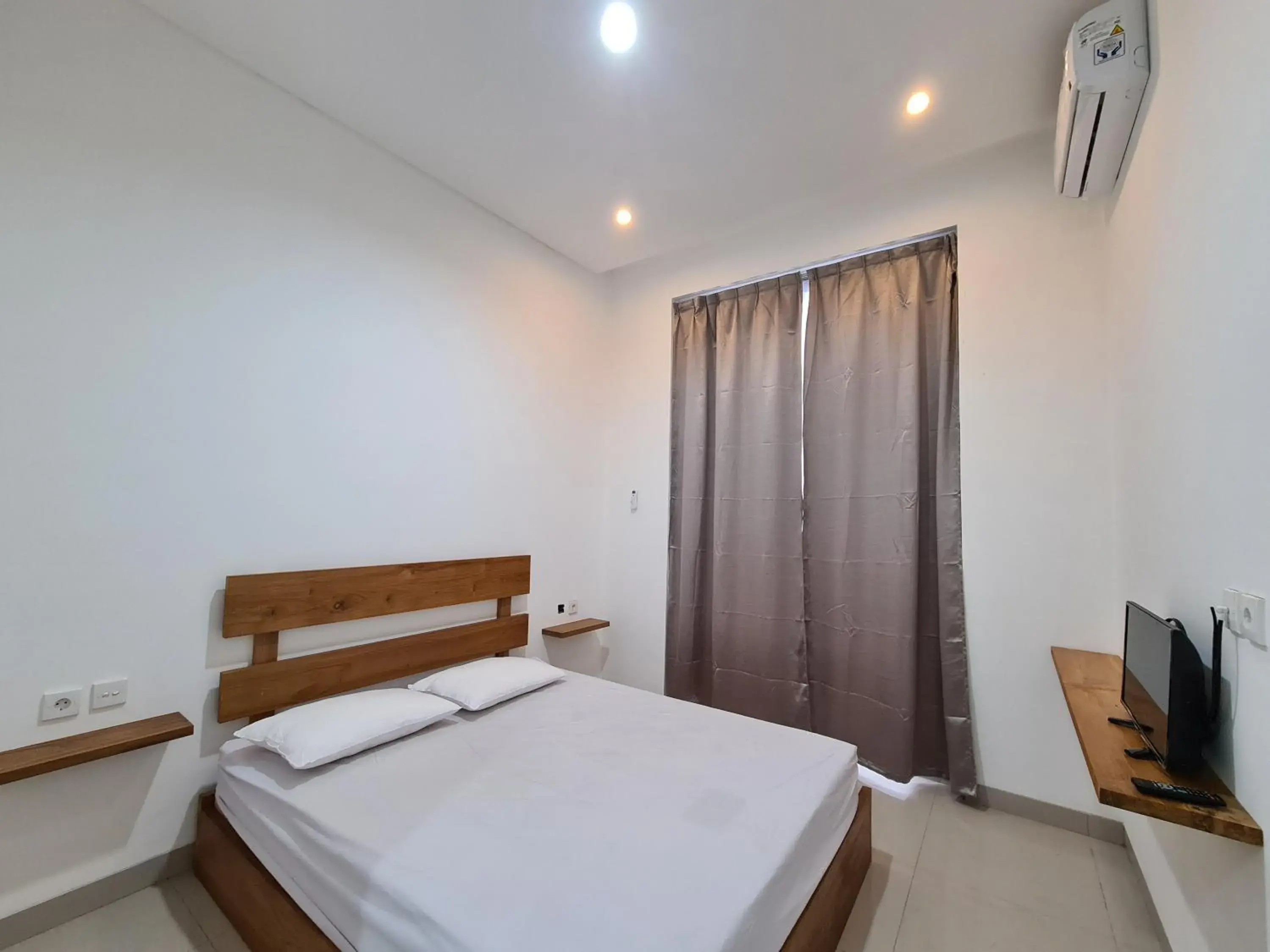 Standard Double Room in Graha Martadinata Syariah Mitra RedDoorz Standard Double Room in Graha Martadinata Syariah Mitra RedDoorz
