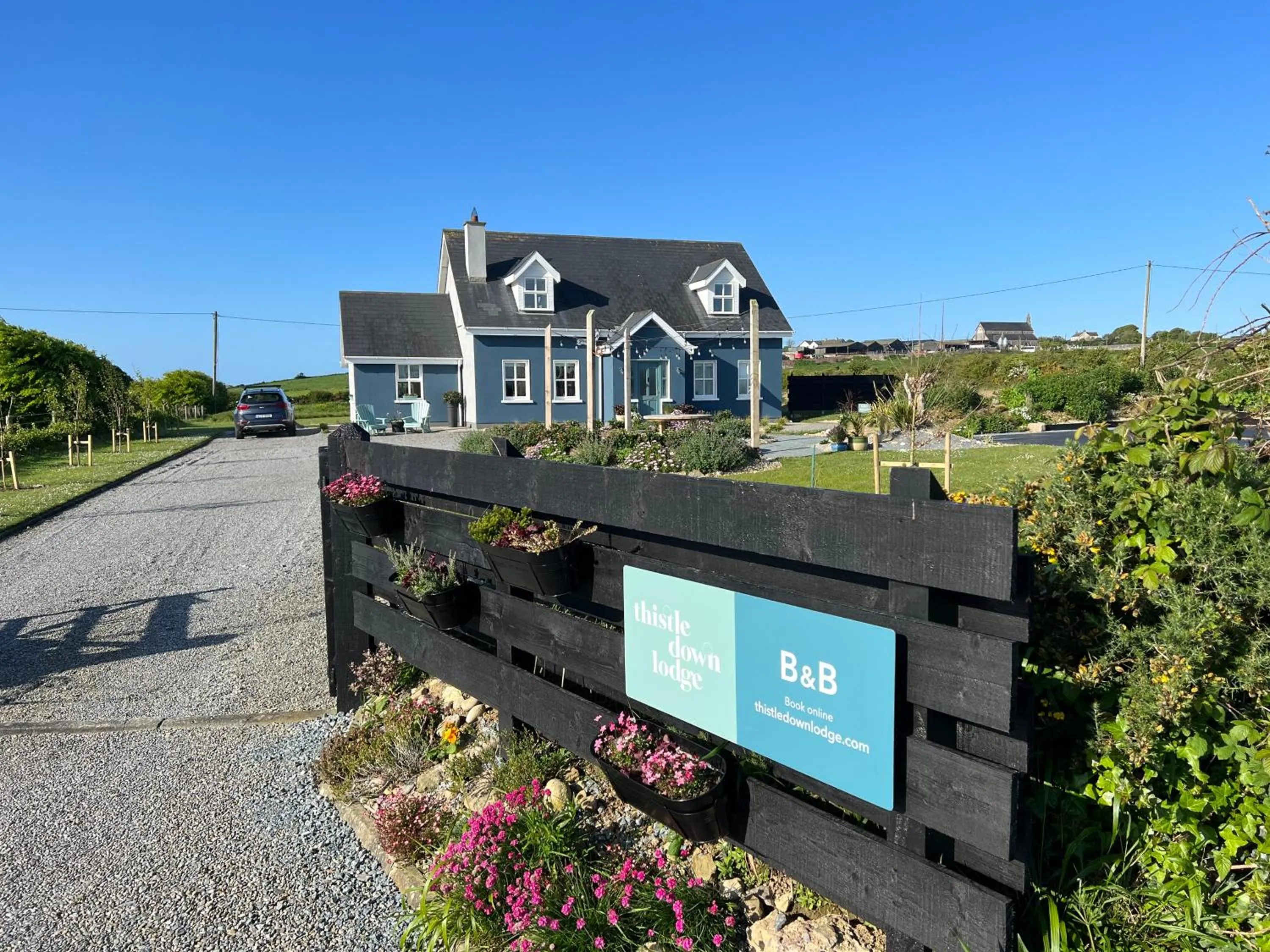 Property logo or sign in Thistledown Lodge