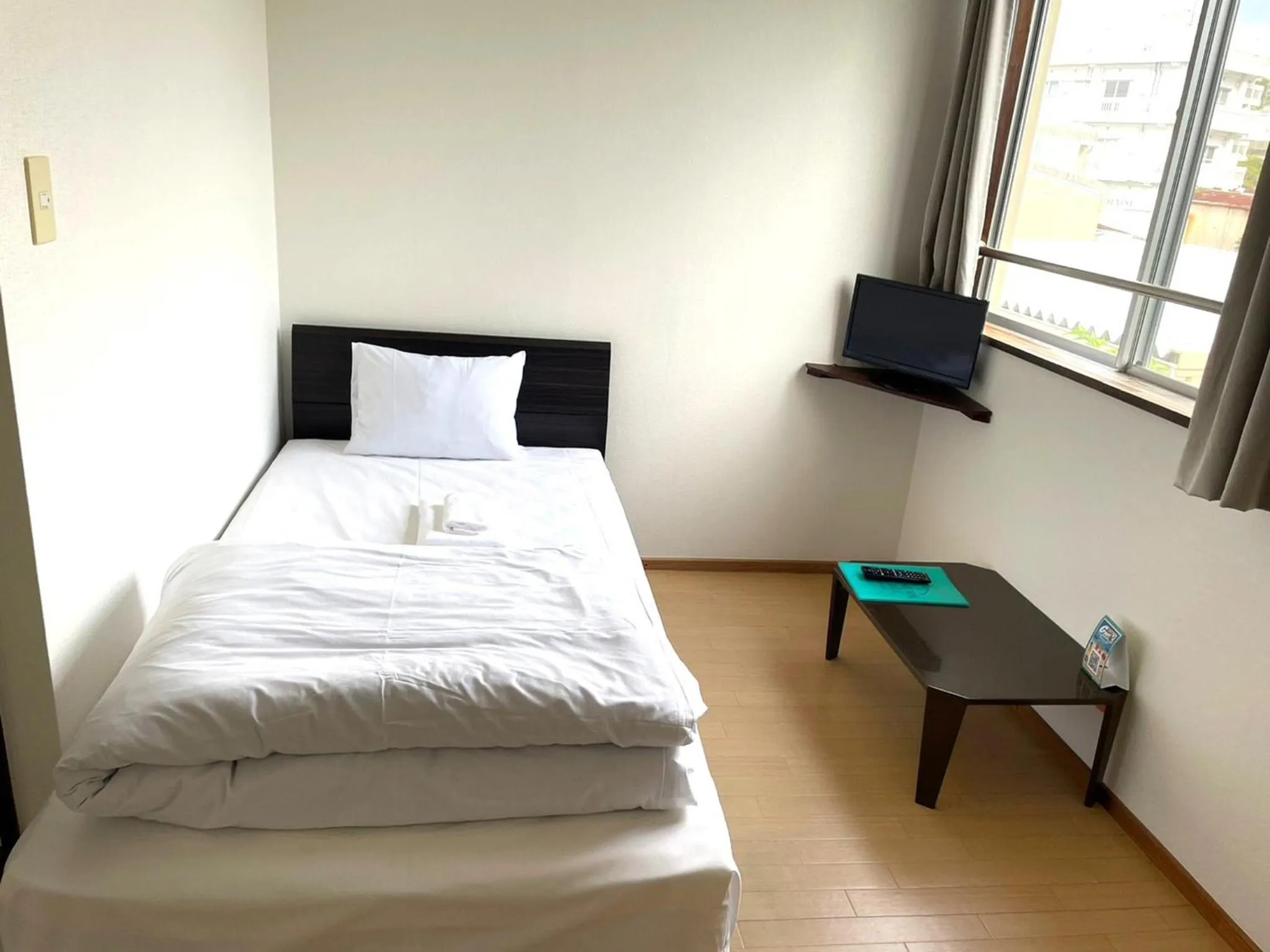Photo of the whole room, Bed in Southern Village Okinawa
