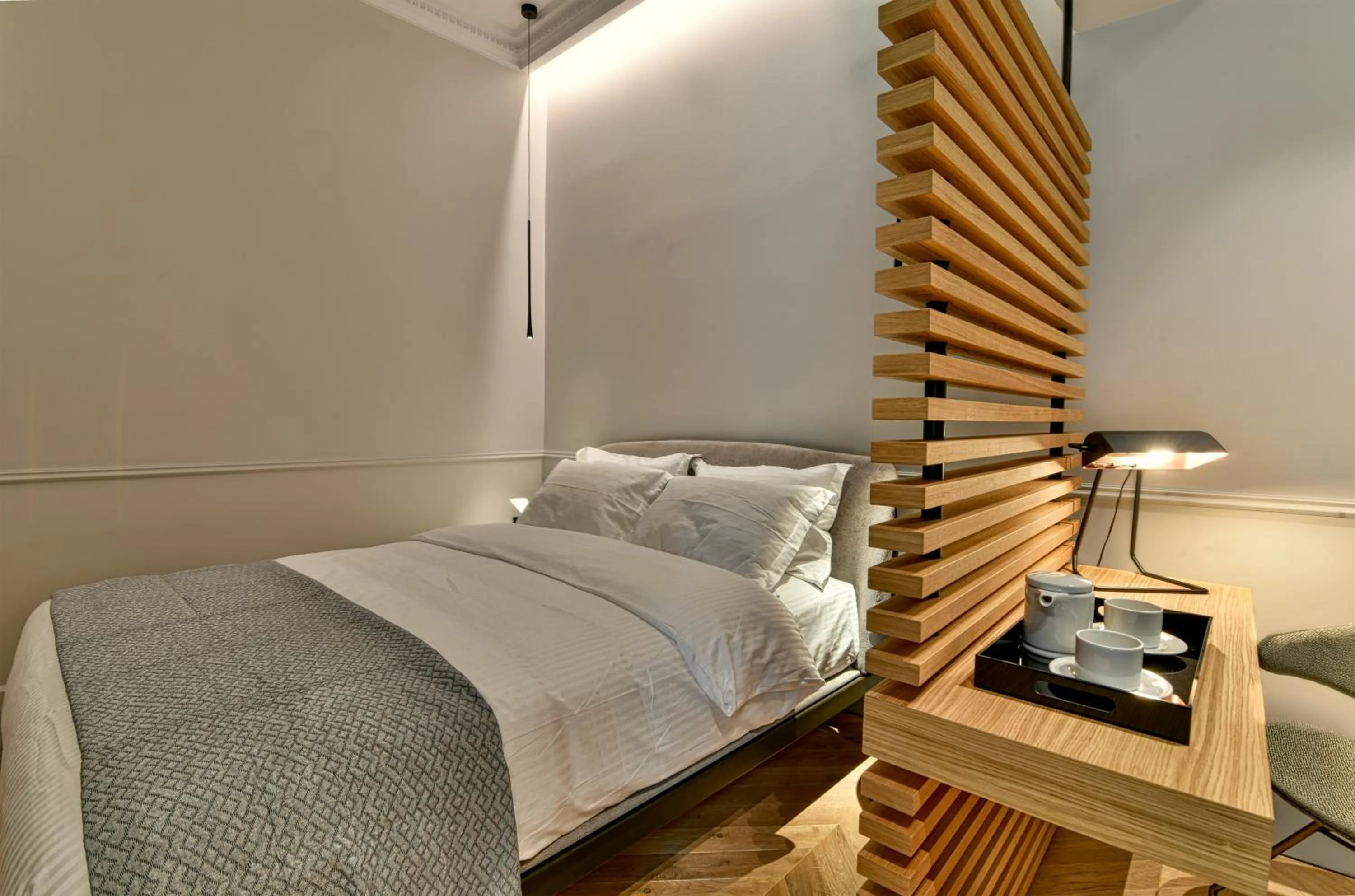 Bed in Nikiou Suites Luxury Residence