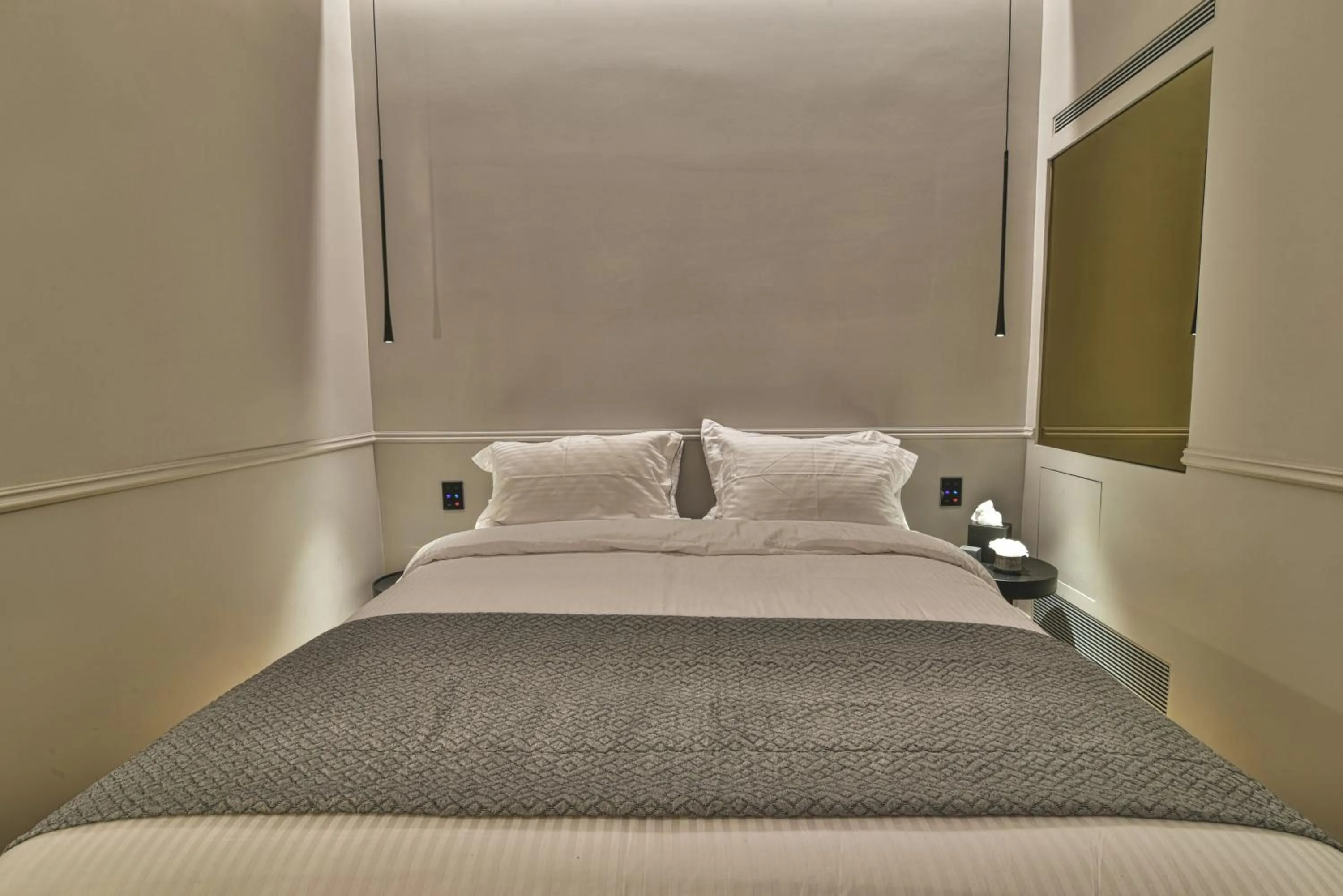 Bed in Nikiou Suites Luxury Residence