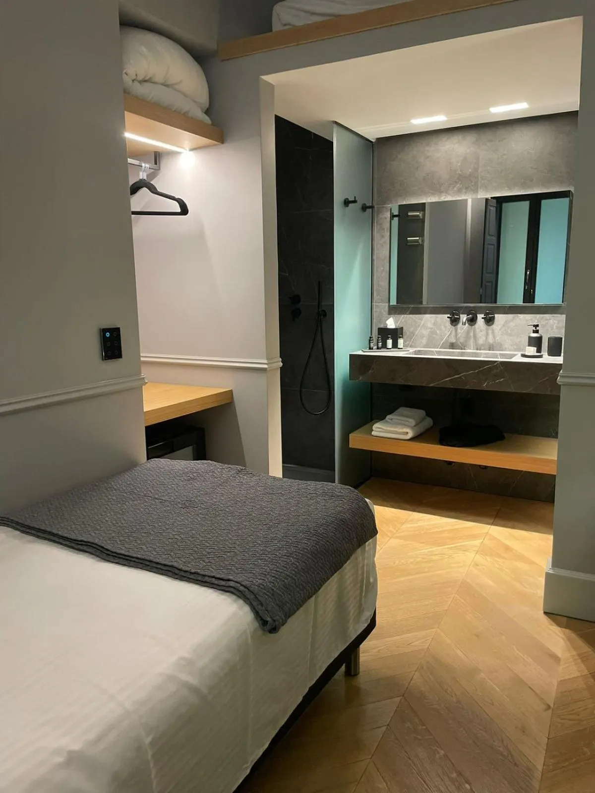 Bed in Nikiou Suites Luxury Residence