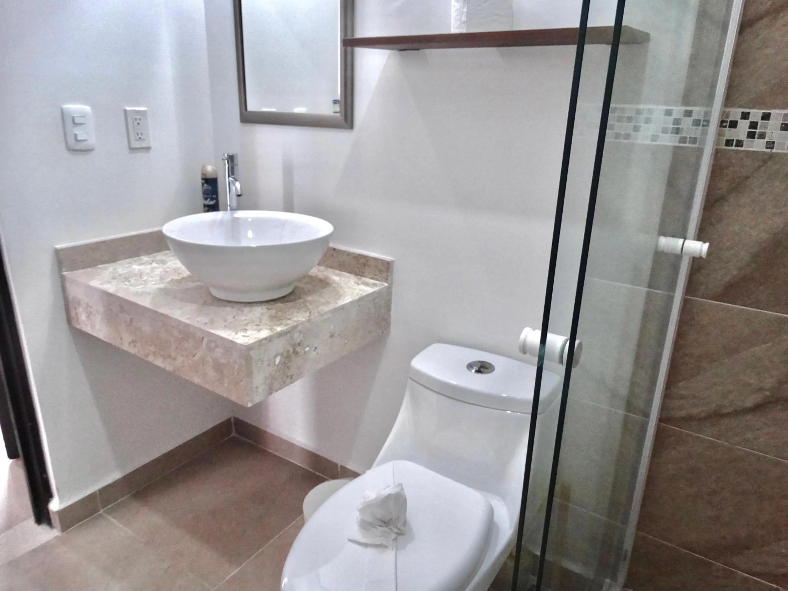 Shower in Dreams Lagoon by Andiani Travel