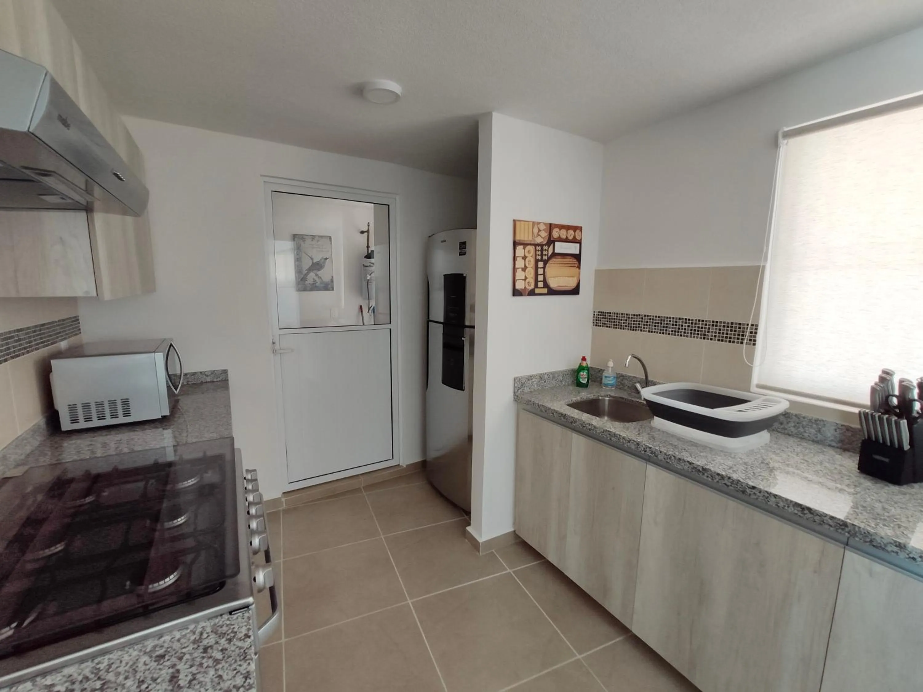 Kitchen or kitchenette in Dreams Lagoon by Andiani Travel