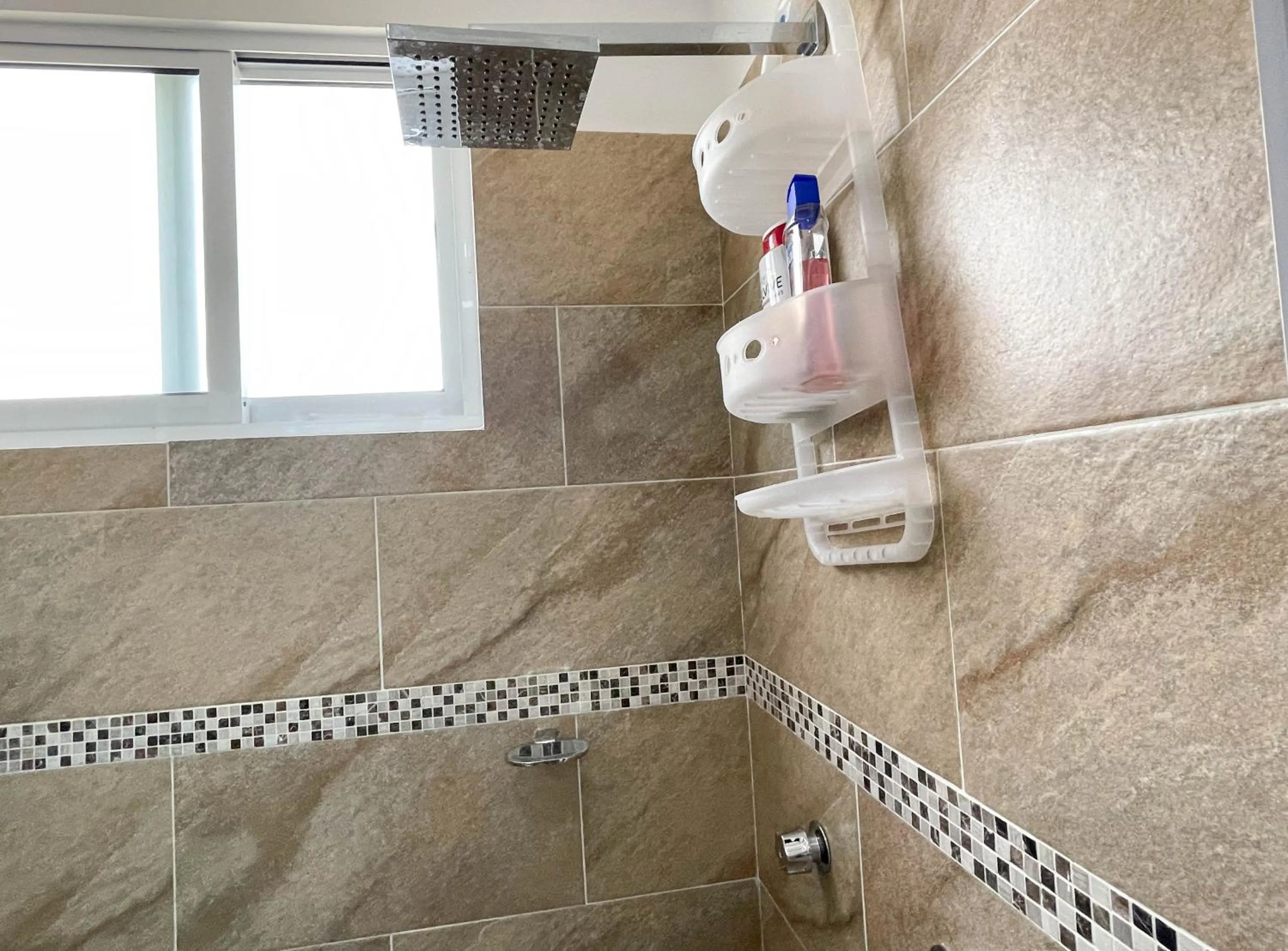 Shower in Dreams Lagoon by Andiani Travel