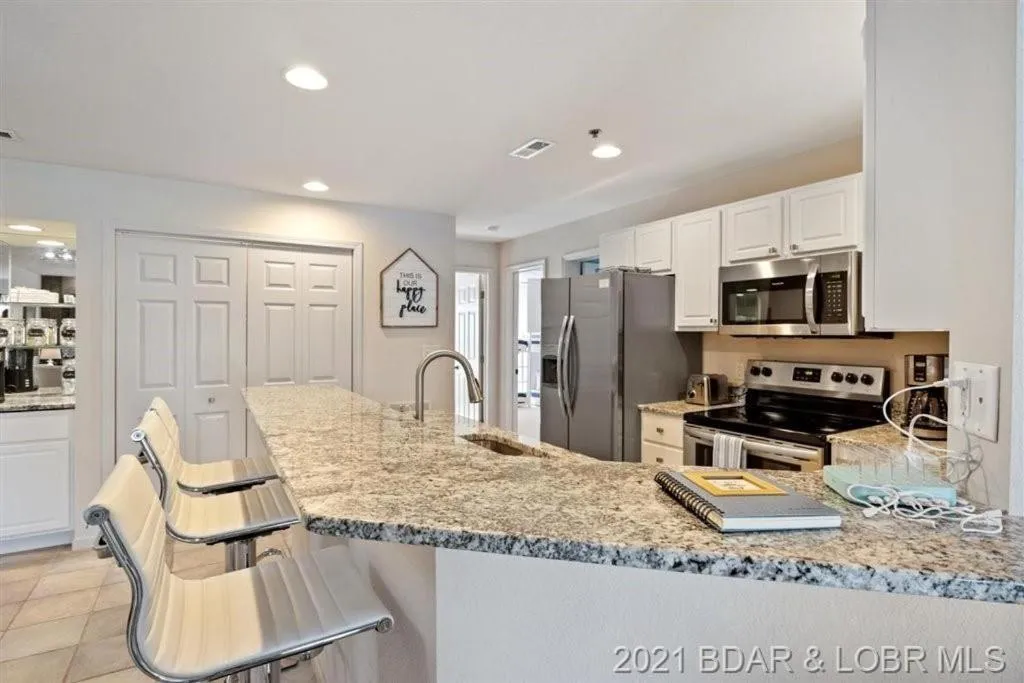 kitchen in Family Fun Lakefront Condo at Parkview Bay