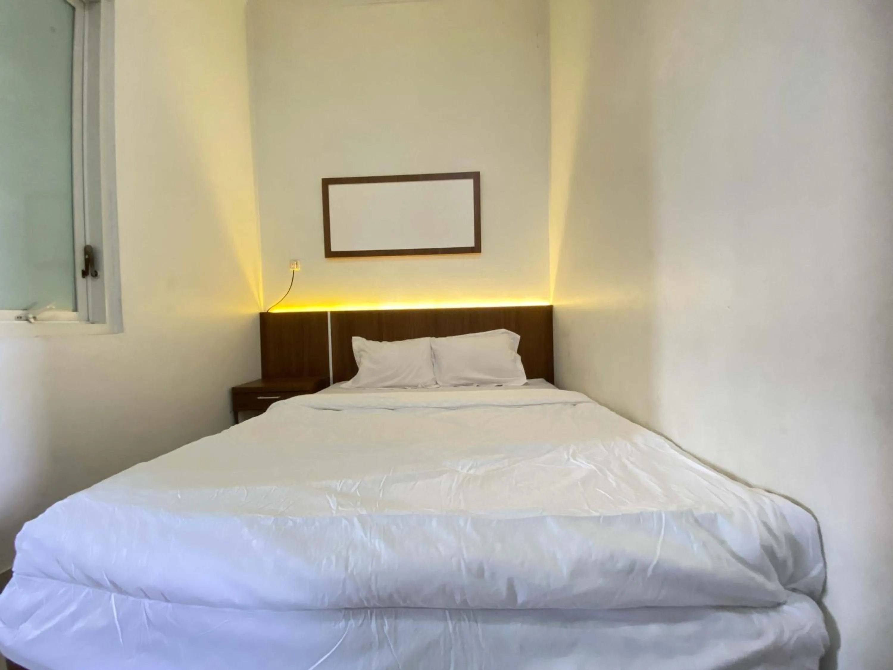 Bed in ANA INN Ambarawa Mitra RedDoorz