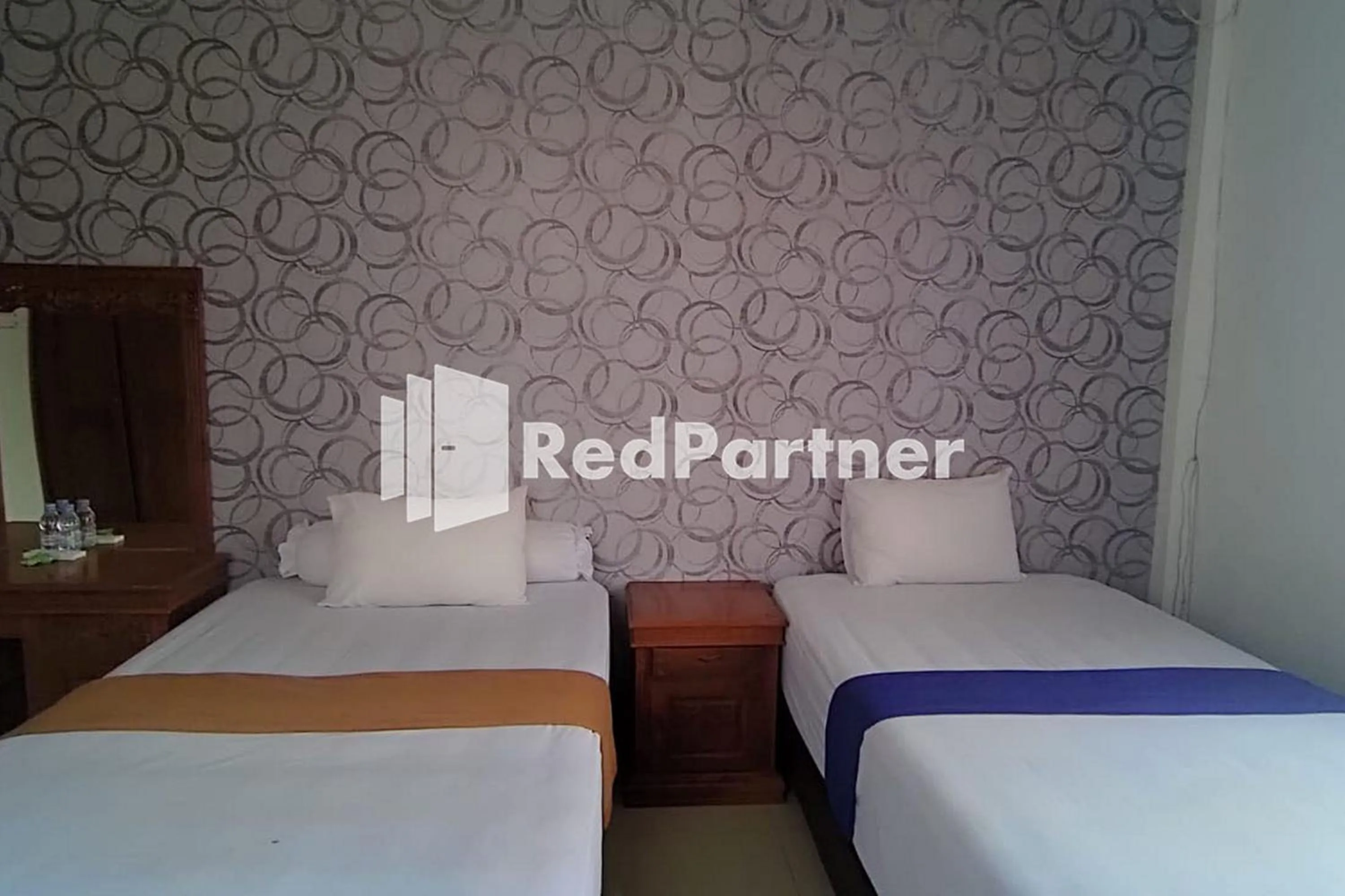 Bed in Hotel Abna Sangatta Mitra RedDoorz