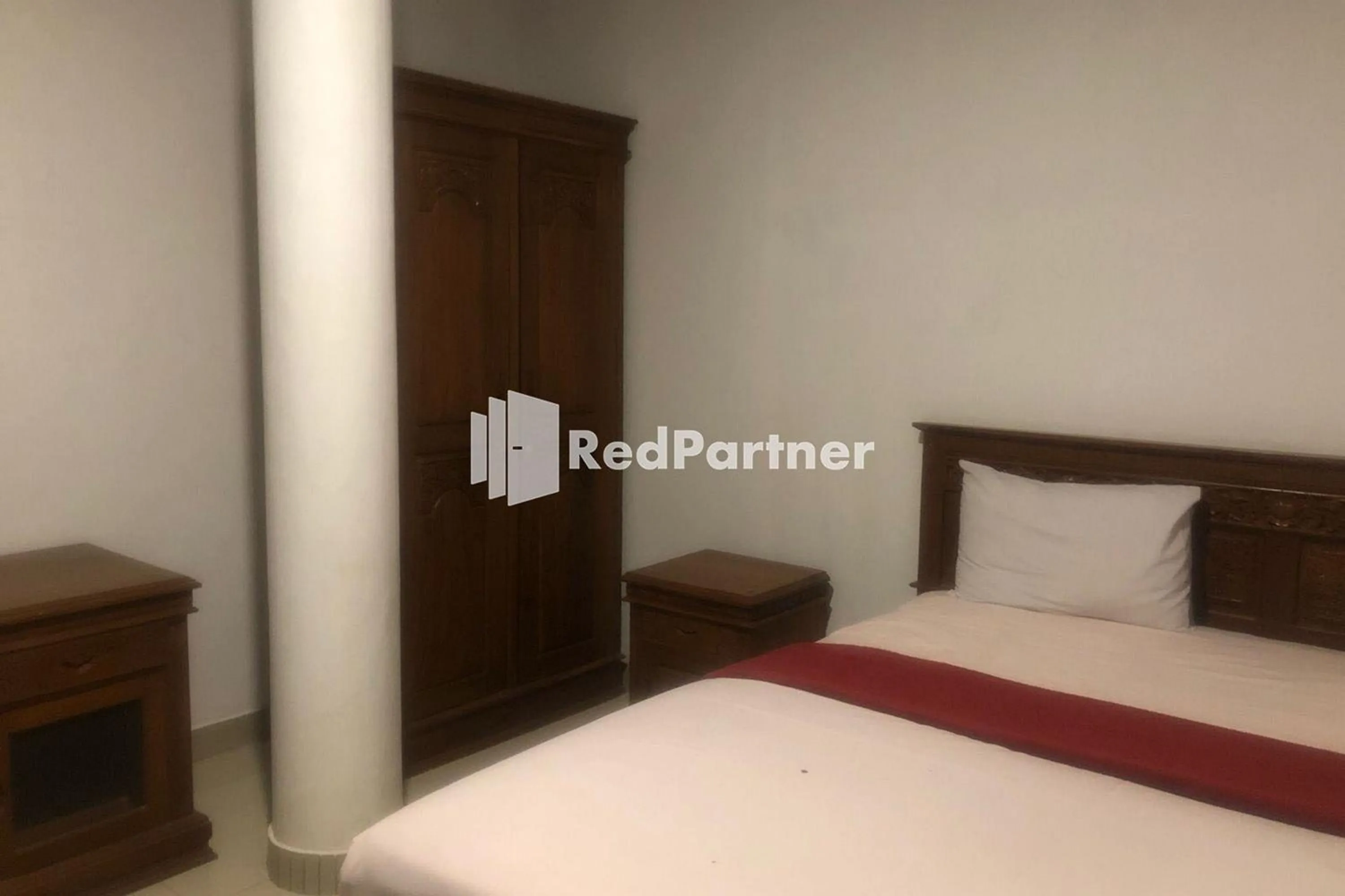 Bed in Hotel Abna Sangatta Mitra RedDoorz
