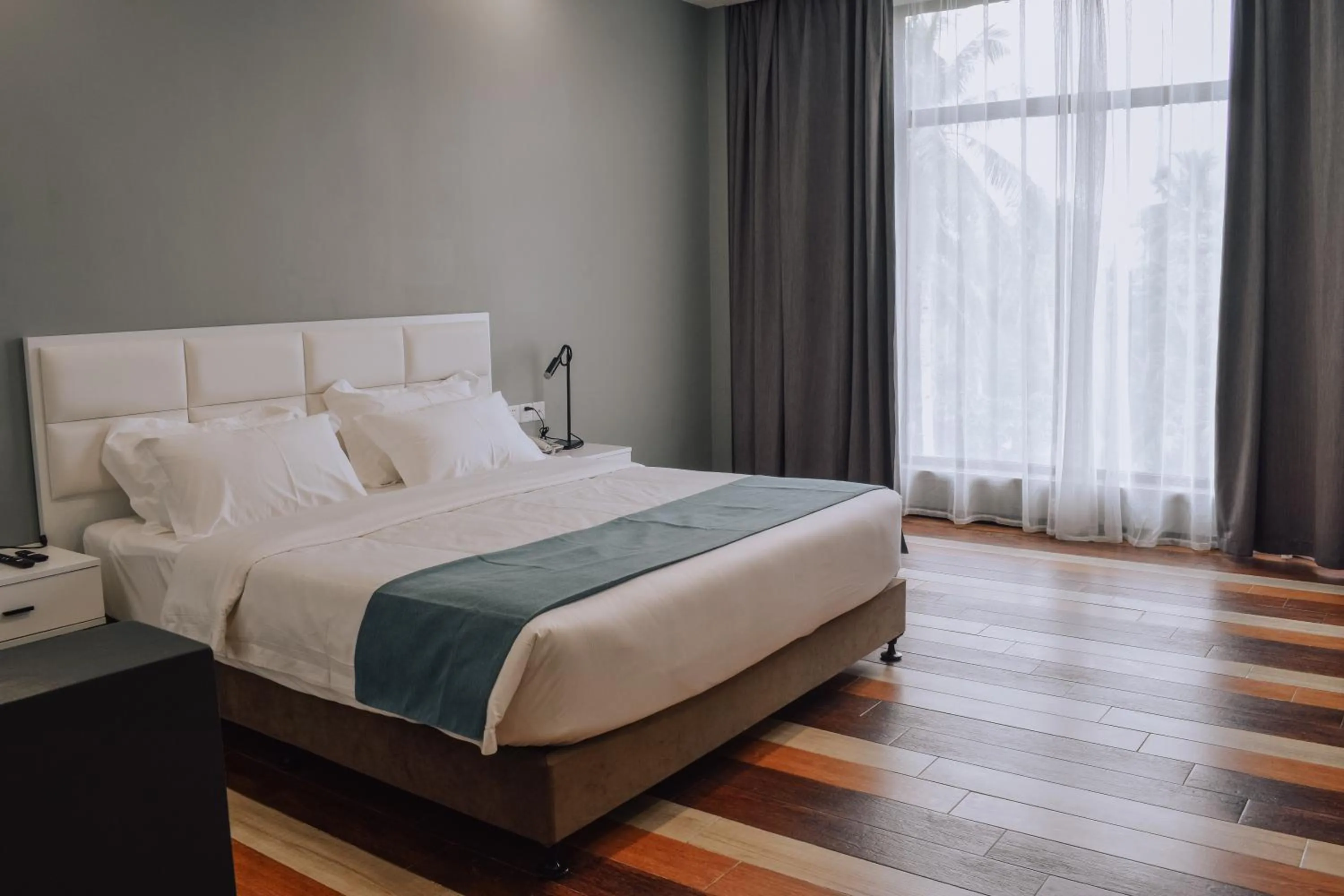 Bed in Fan's Hotel Baybay