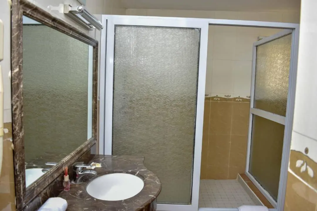 Bathroom in Sonia Hotel