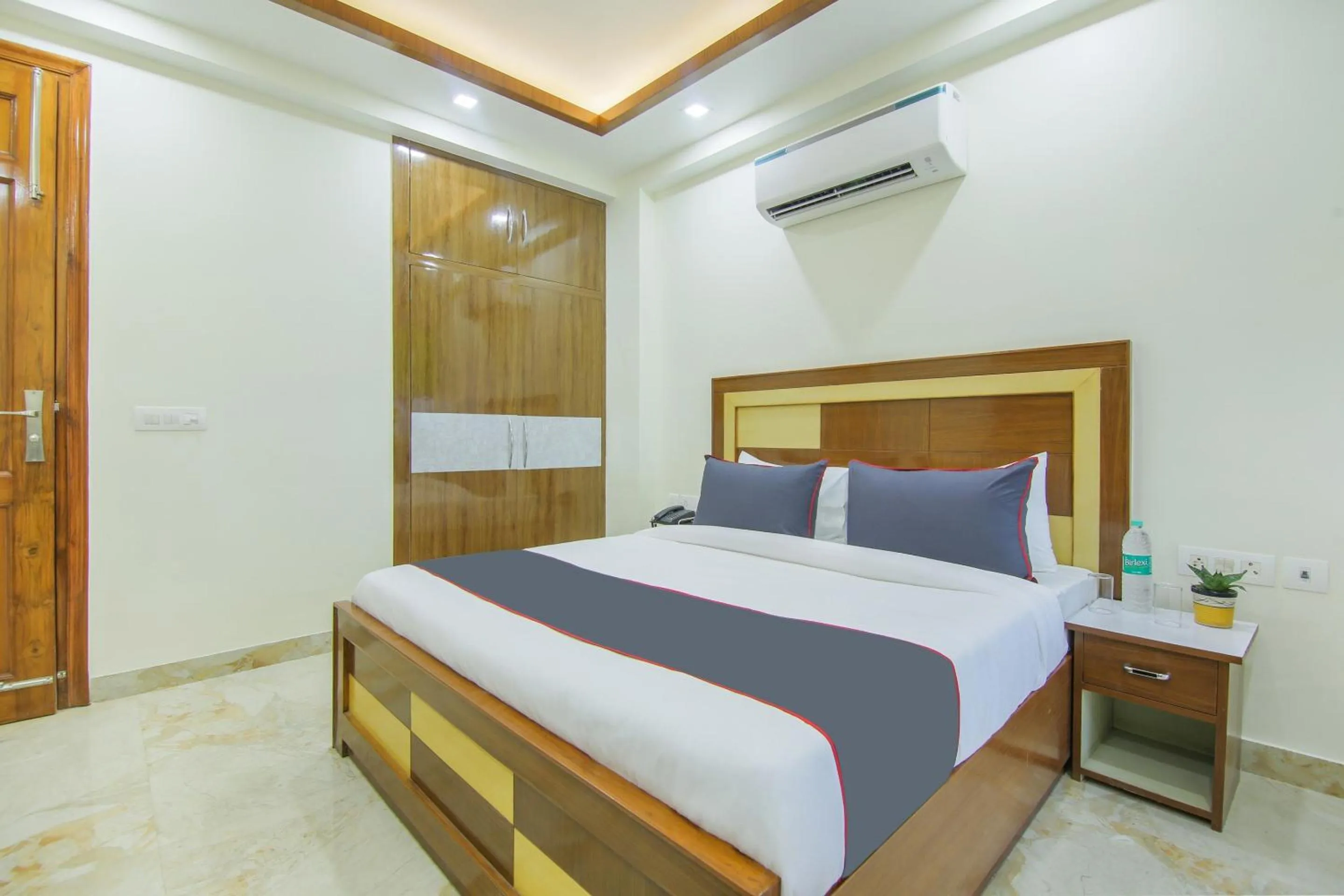 Bedroom, Bed in Collection O Corporate Suite Near Omaxe Celebration Mall