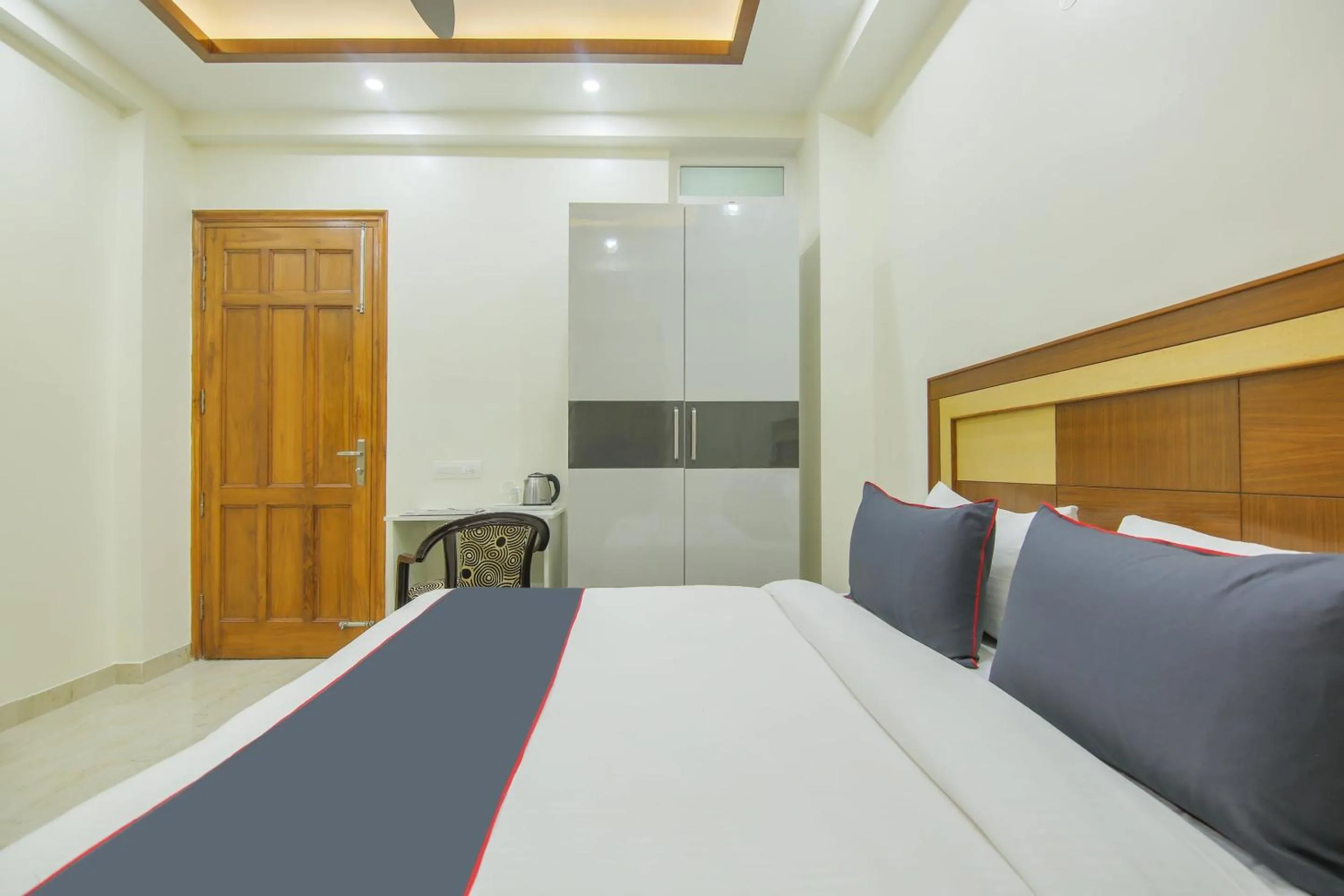 Bedroom, Bed in Collection O Corporate Suite Near Omaxe Celebration Mall
