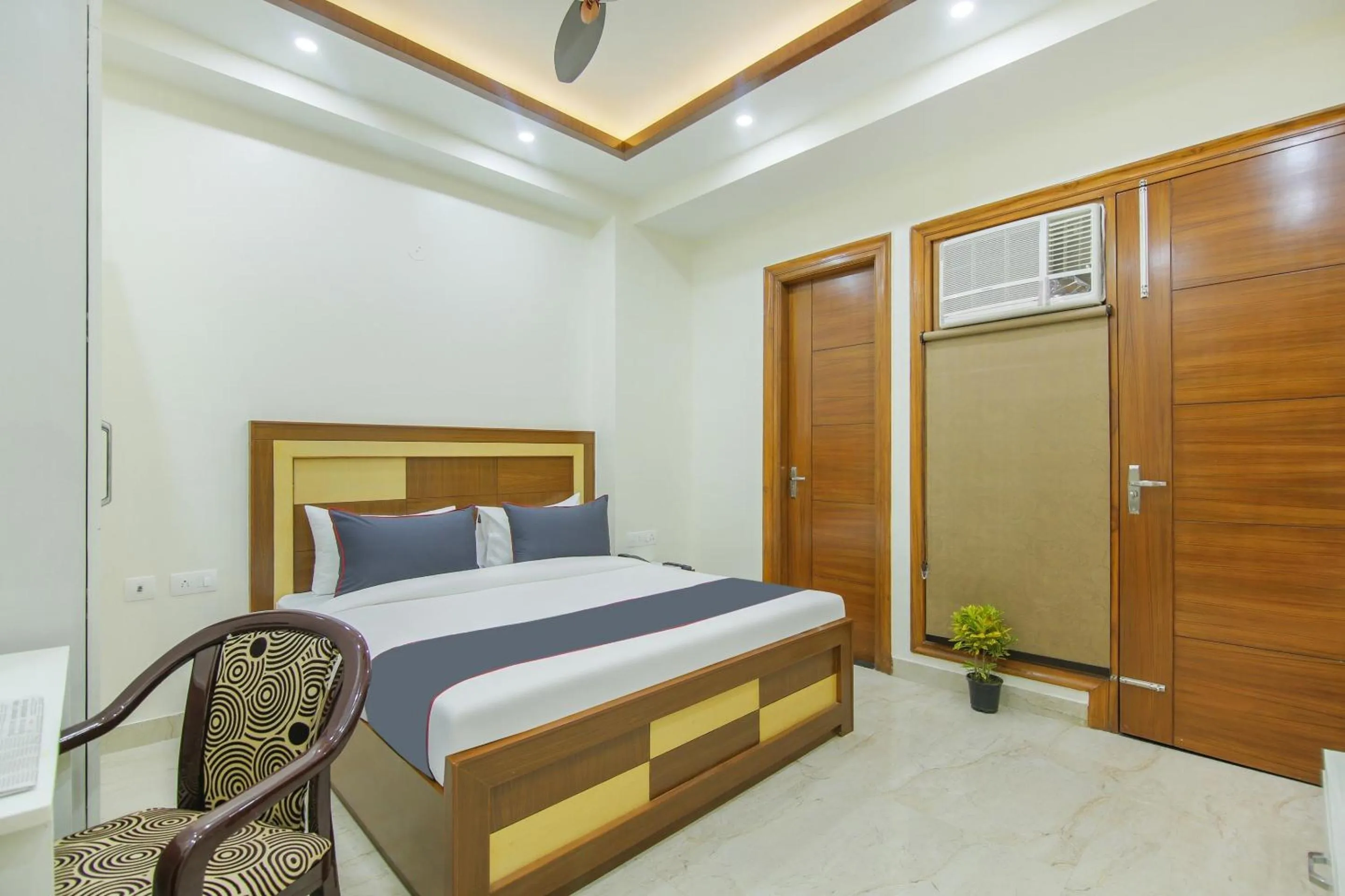 Bedroom, Bed in Collection O Corporate Suite Near Omaxe Celebration Mall