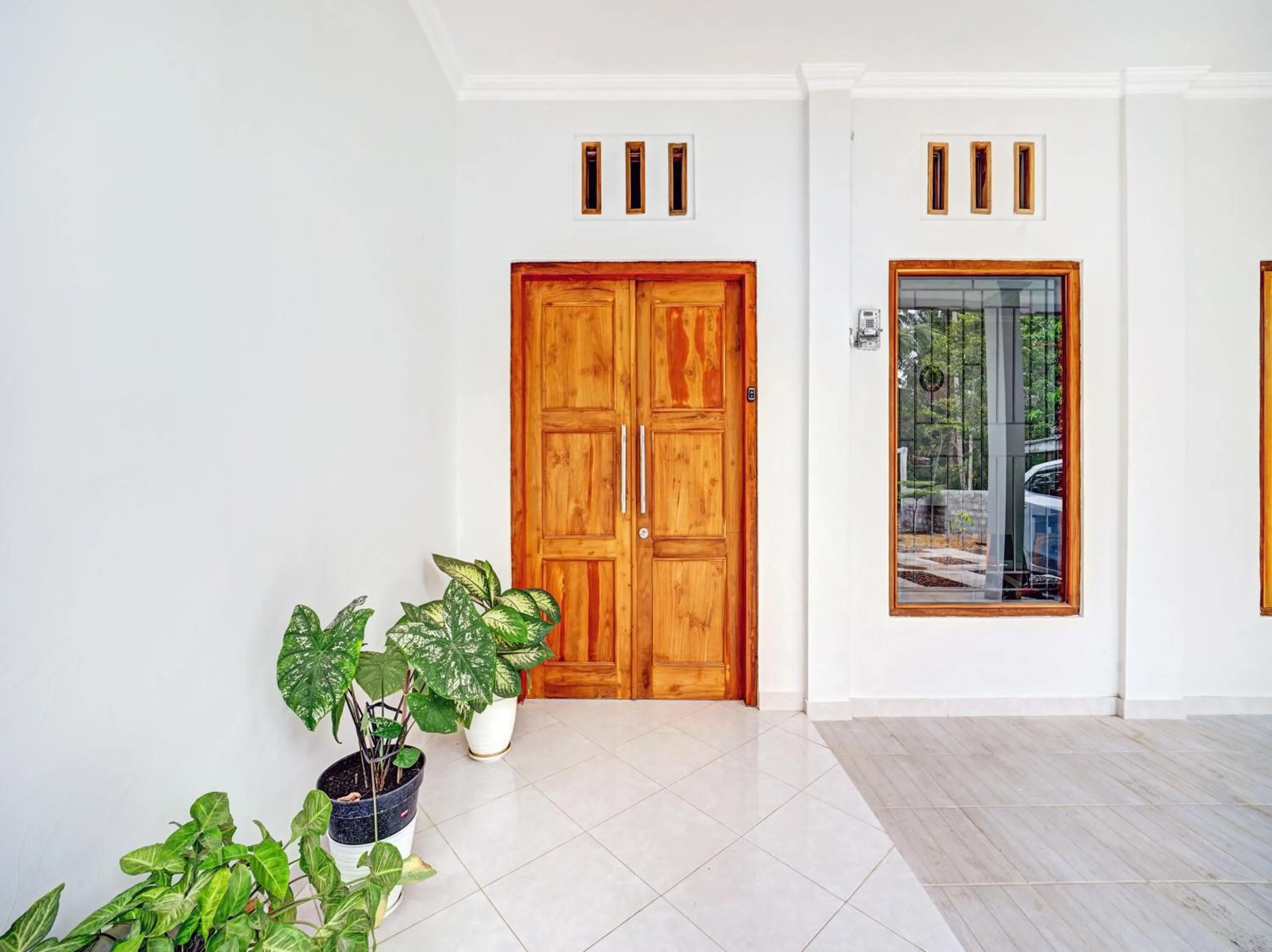 Facade/entrance in RedDoorz at Omah Candi Sari near Airport YIA