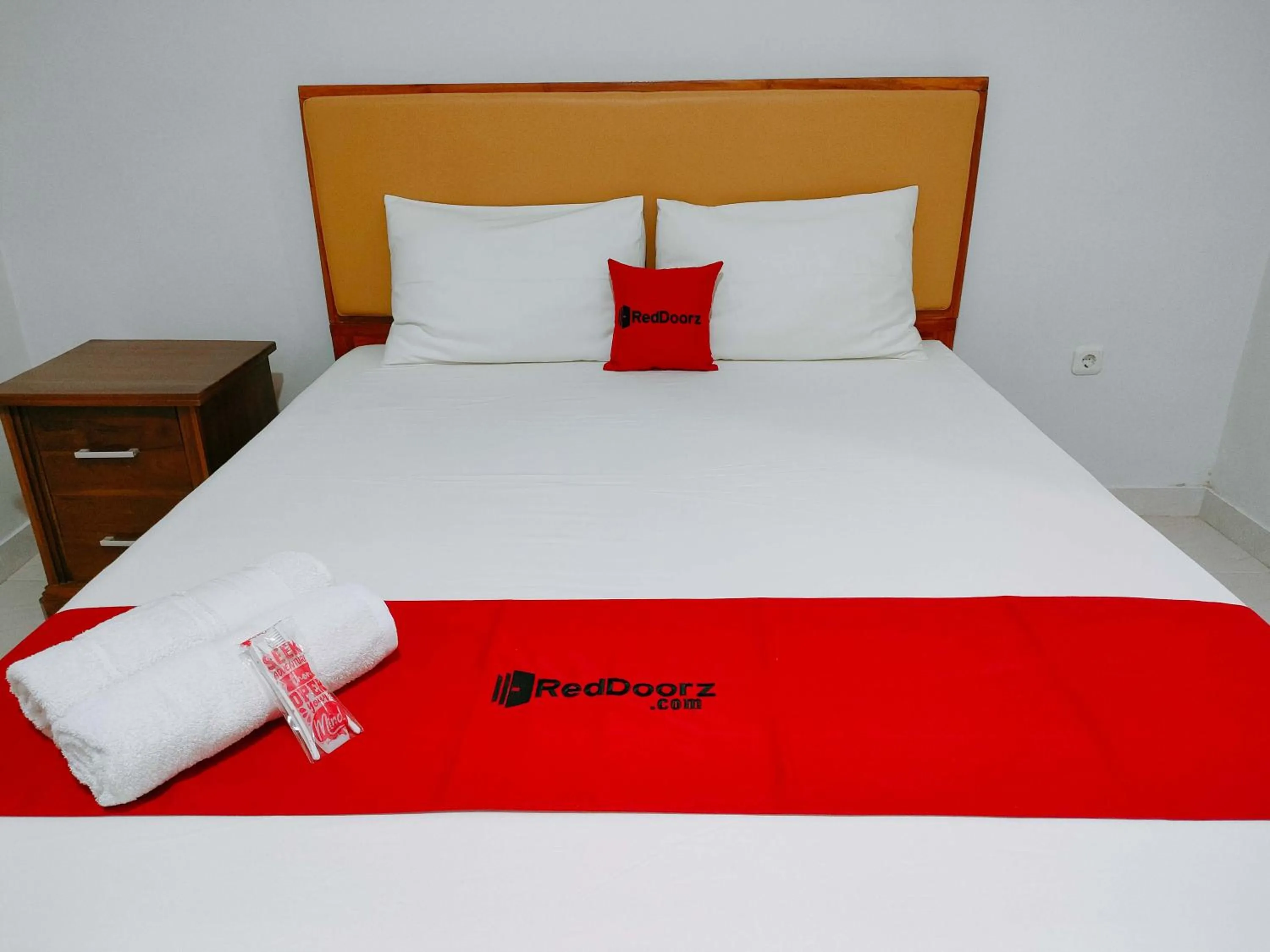 Bed in RedDoorz at Omah Candi Sari near Airport YIA