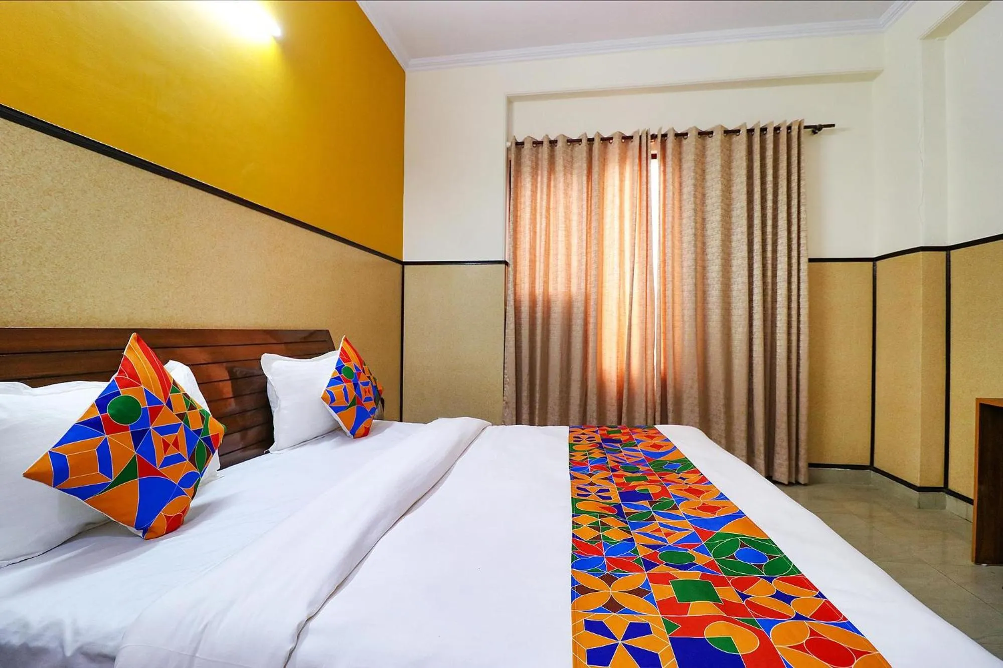 Bed in FabHotel Elite Peak