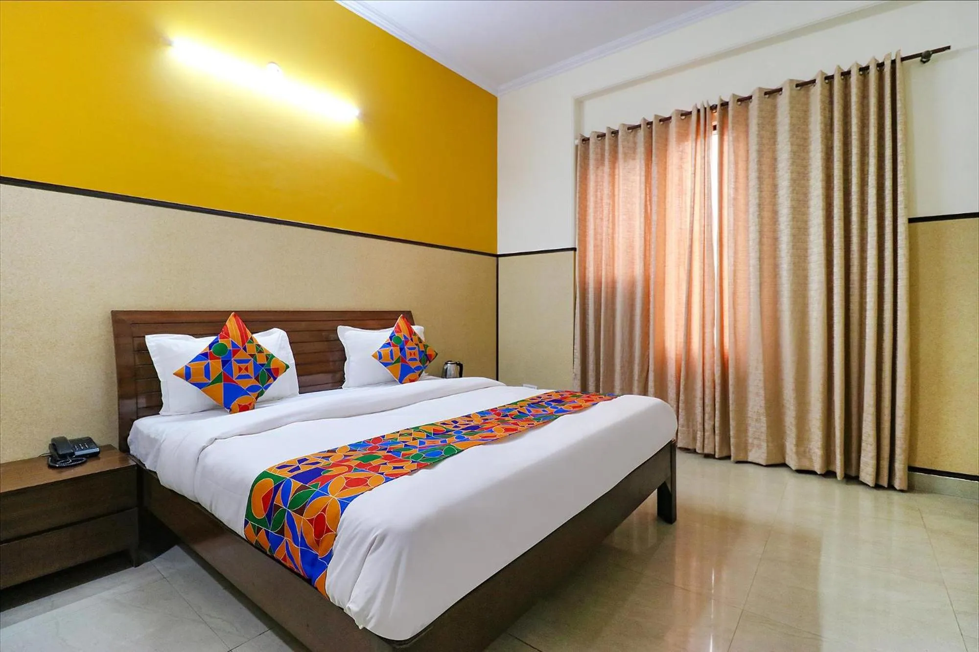 Bed in FabHotel Elite Peak