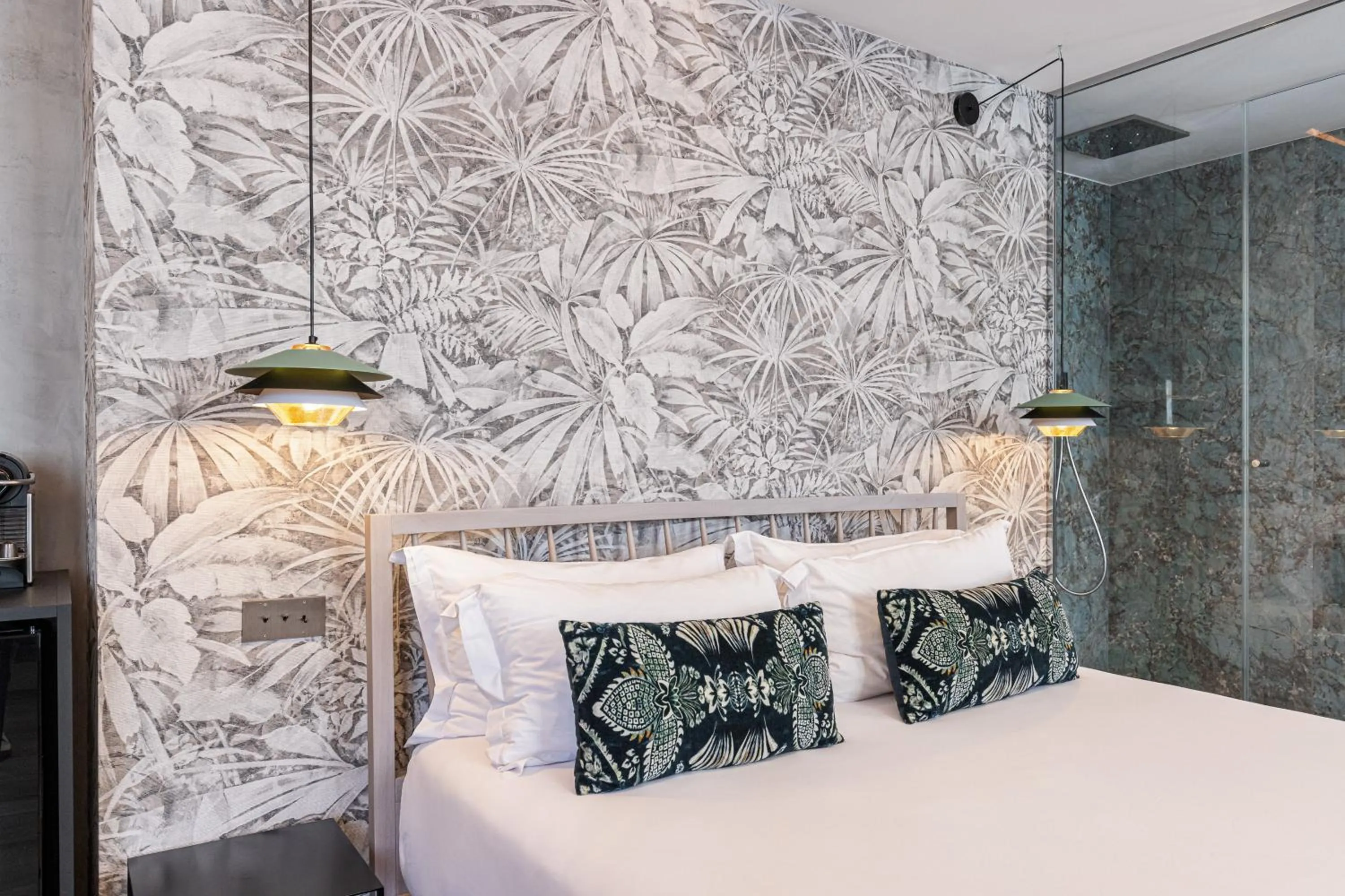 Bed in Le Dortoir Boutique Suites