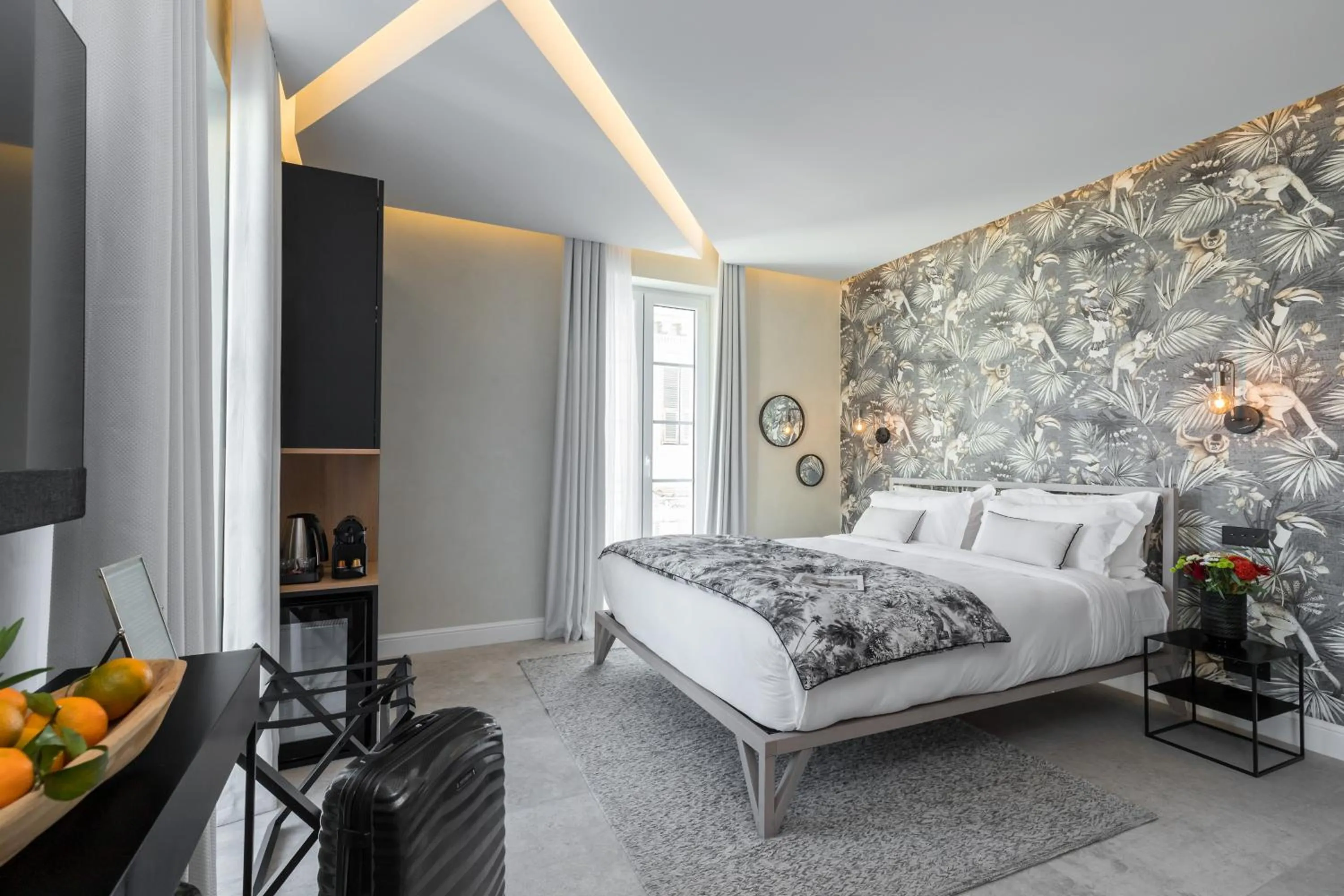 Bed in Le Dortoir Boutique Suites