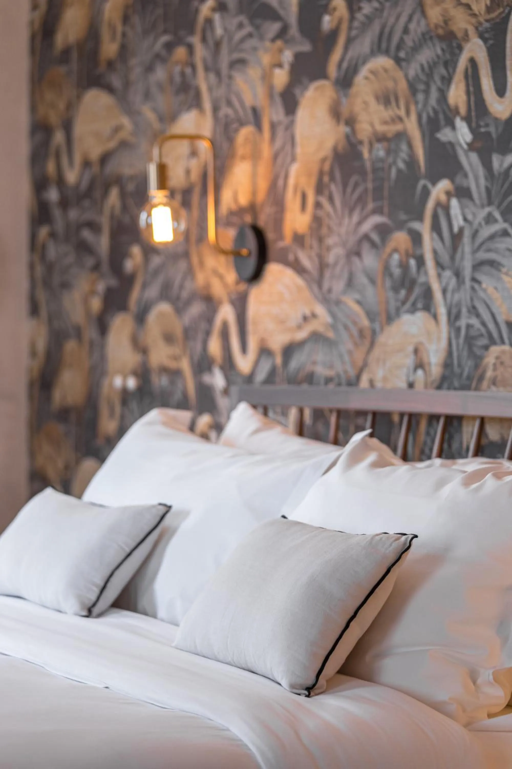 Bed in Le Dortoir Boutique Suites