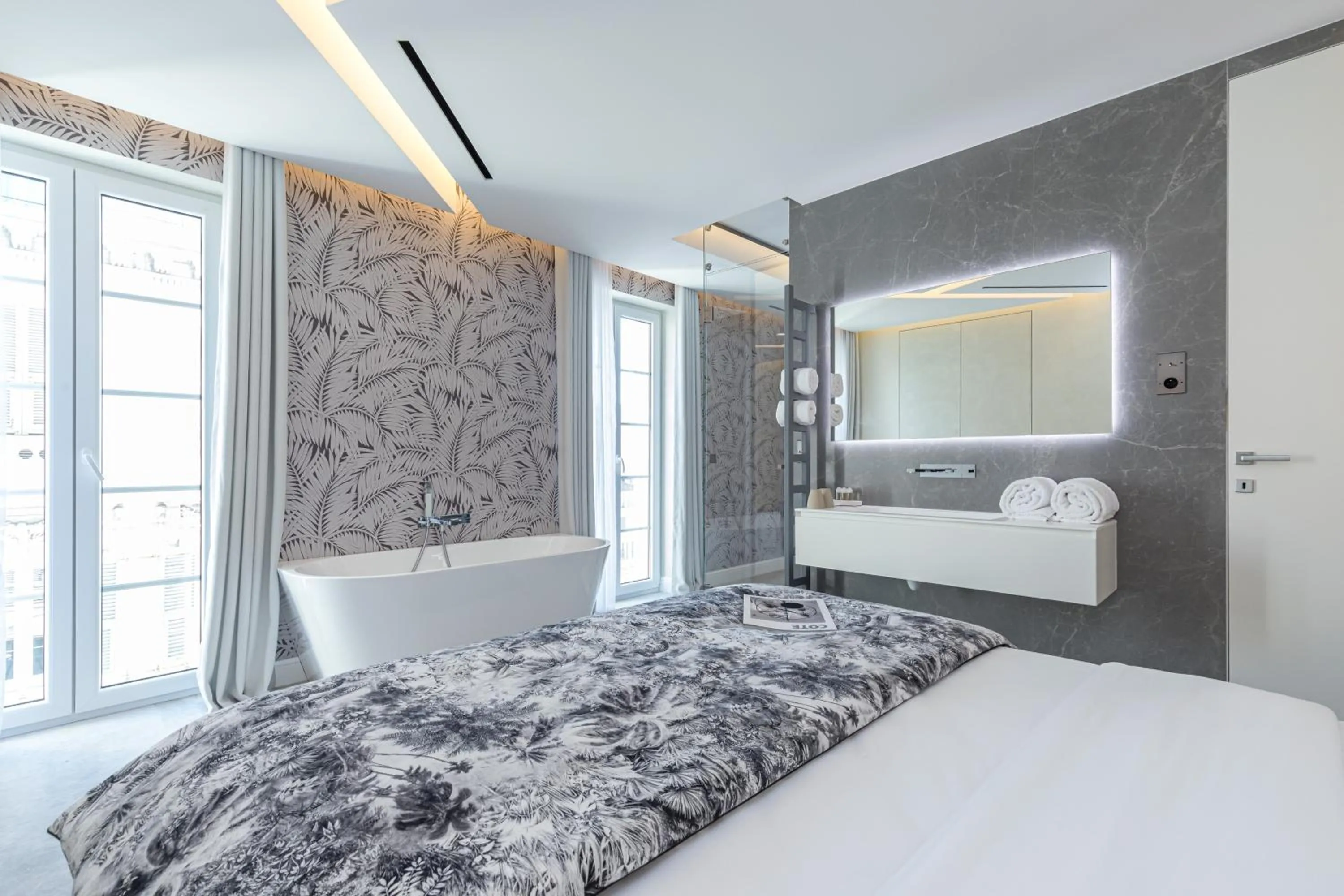 Bed in Le Dortoir Boutique Suites