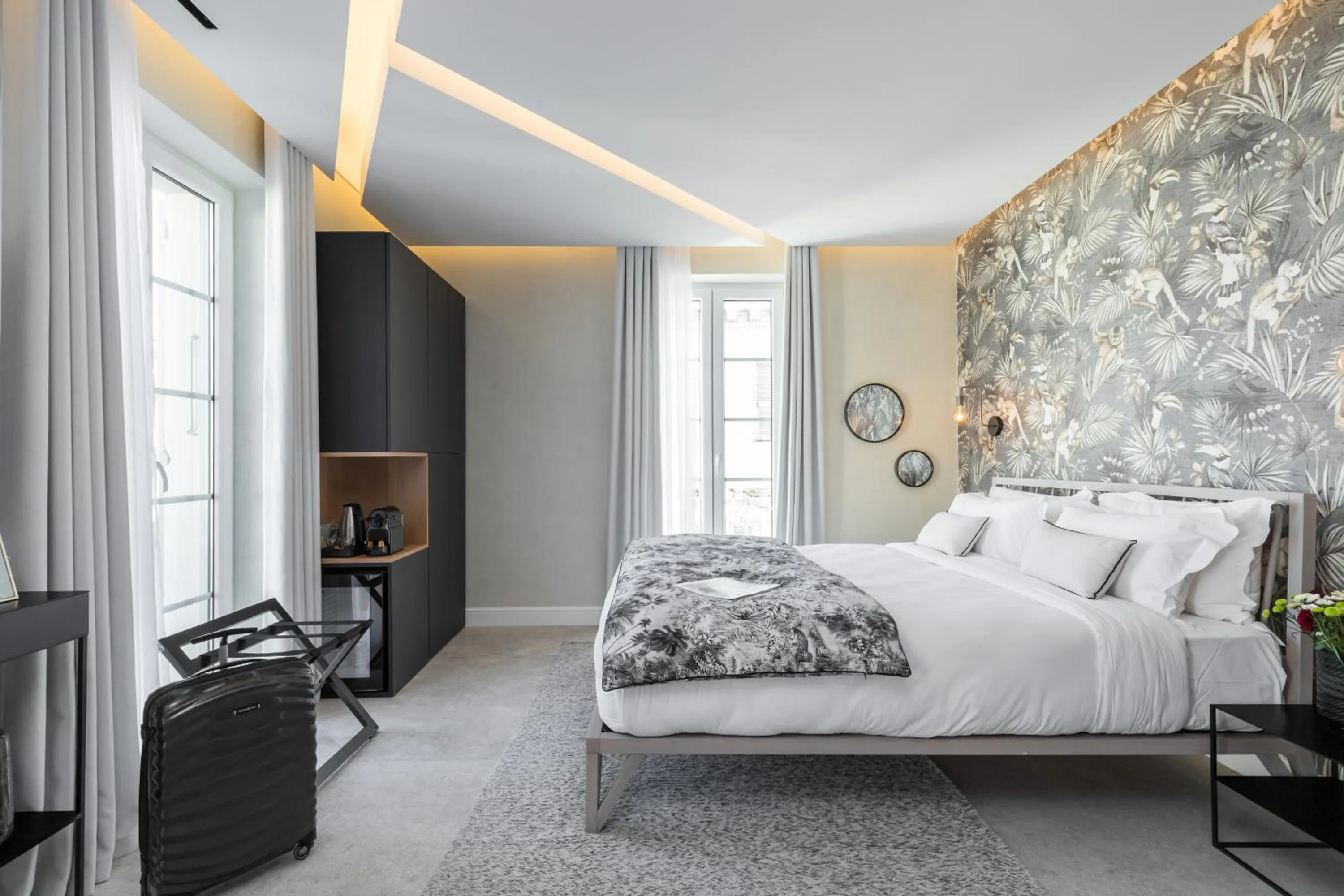 Bed in Le Dortoir Boutique Suites