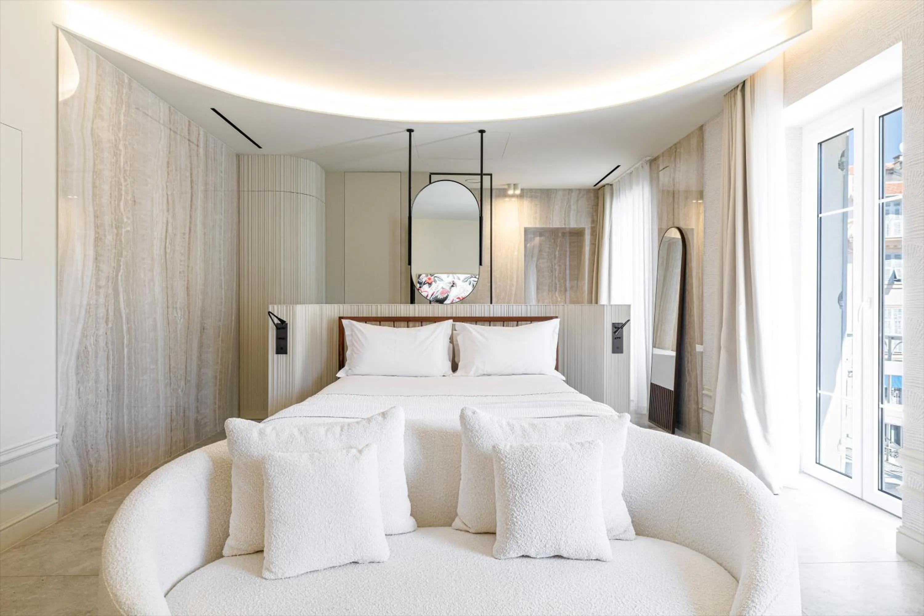 Bed in Le Dortoir Boutique Suites